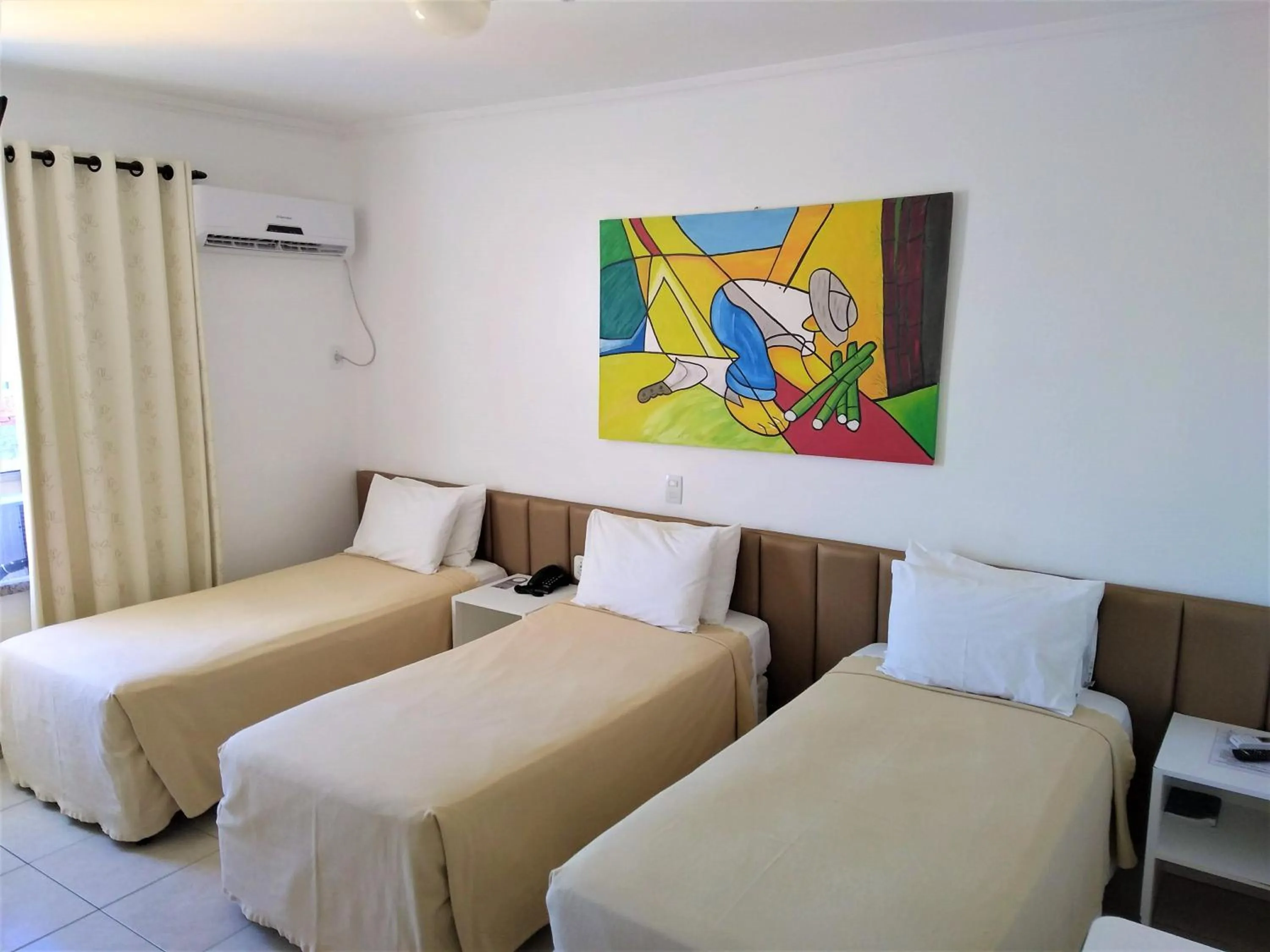 Photo of the whole room, Bed in Simas Praia Hotel