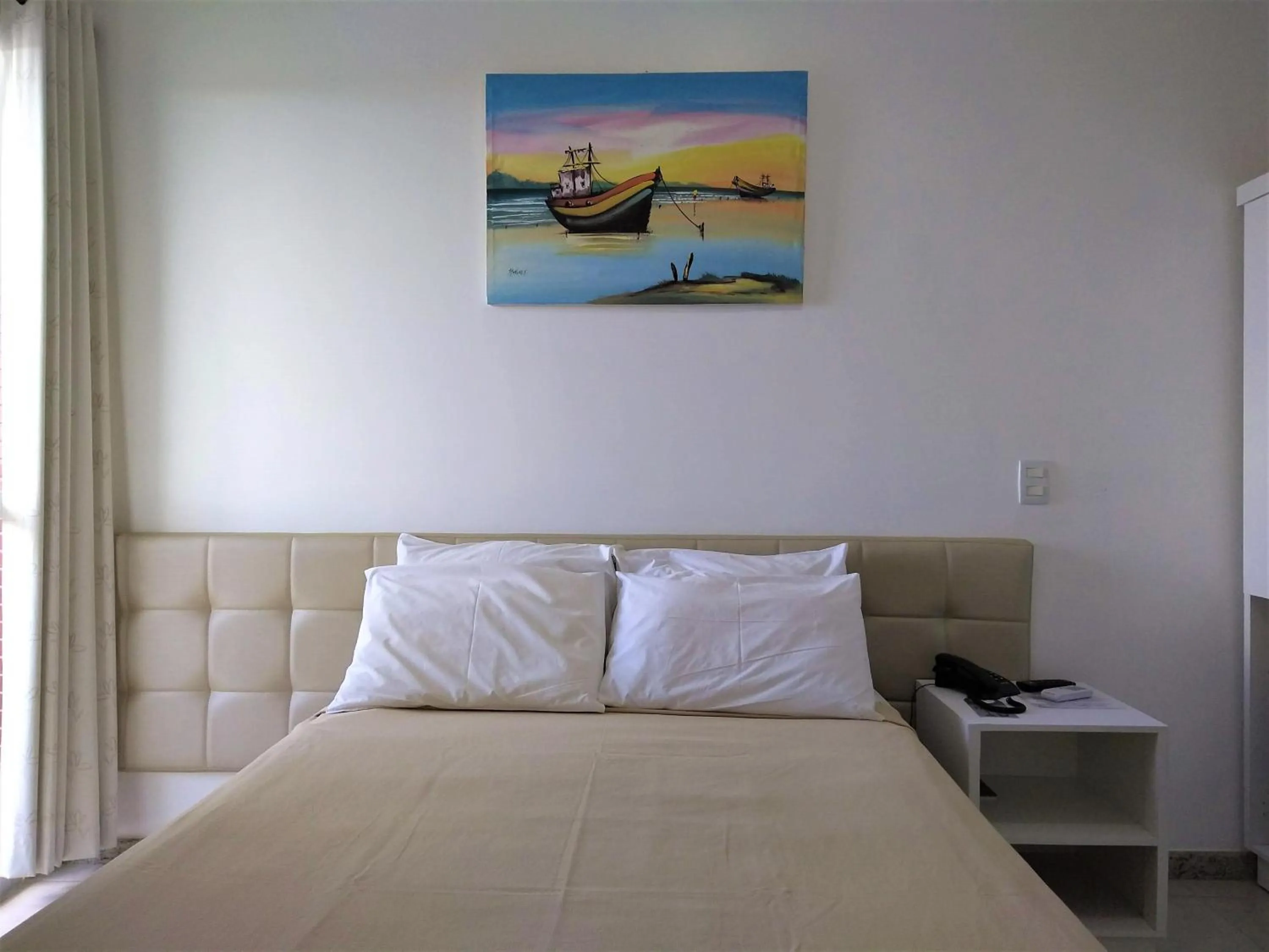 Photo of the whole room, Bed in Simas Praia Hotel