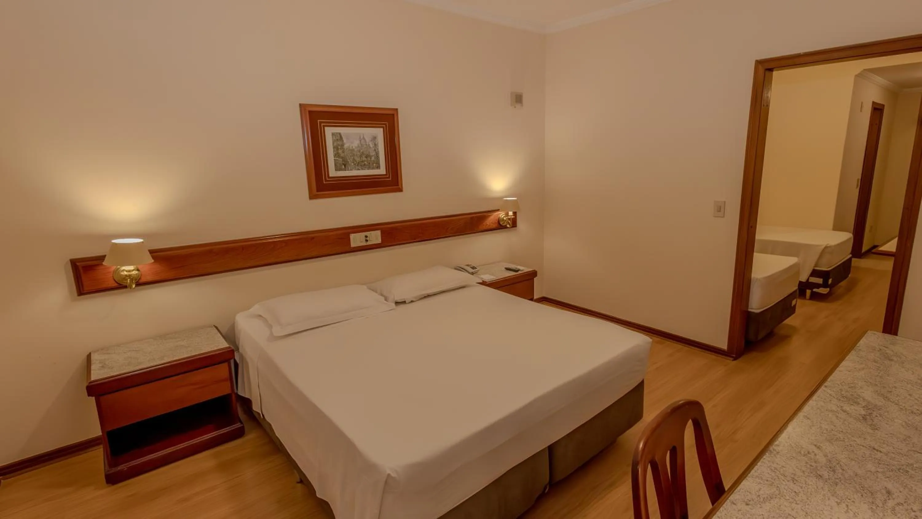 Bed in Lizon Curitiba Hotel