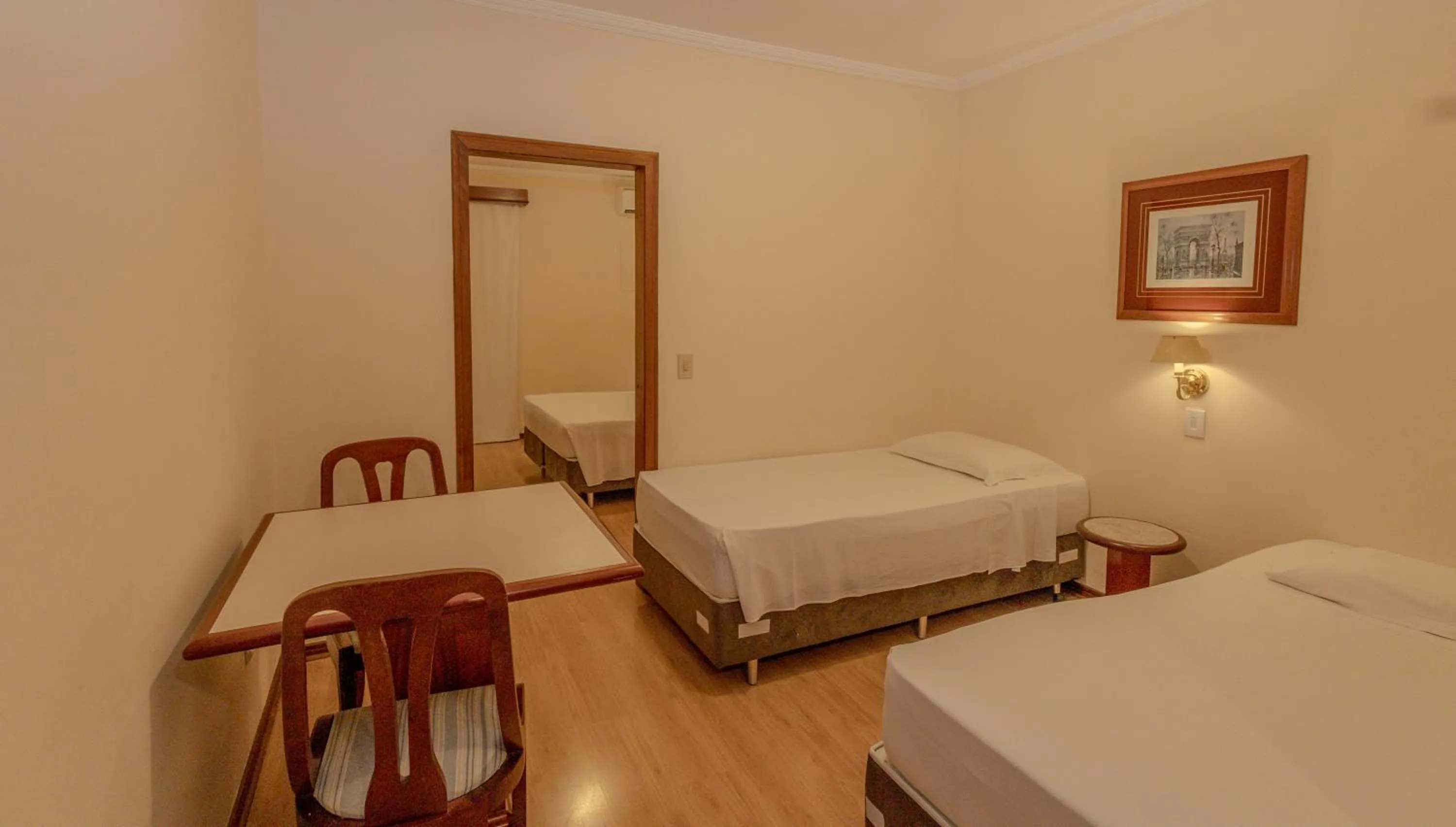 Bed in Lizon Curitiba Hotel