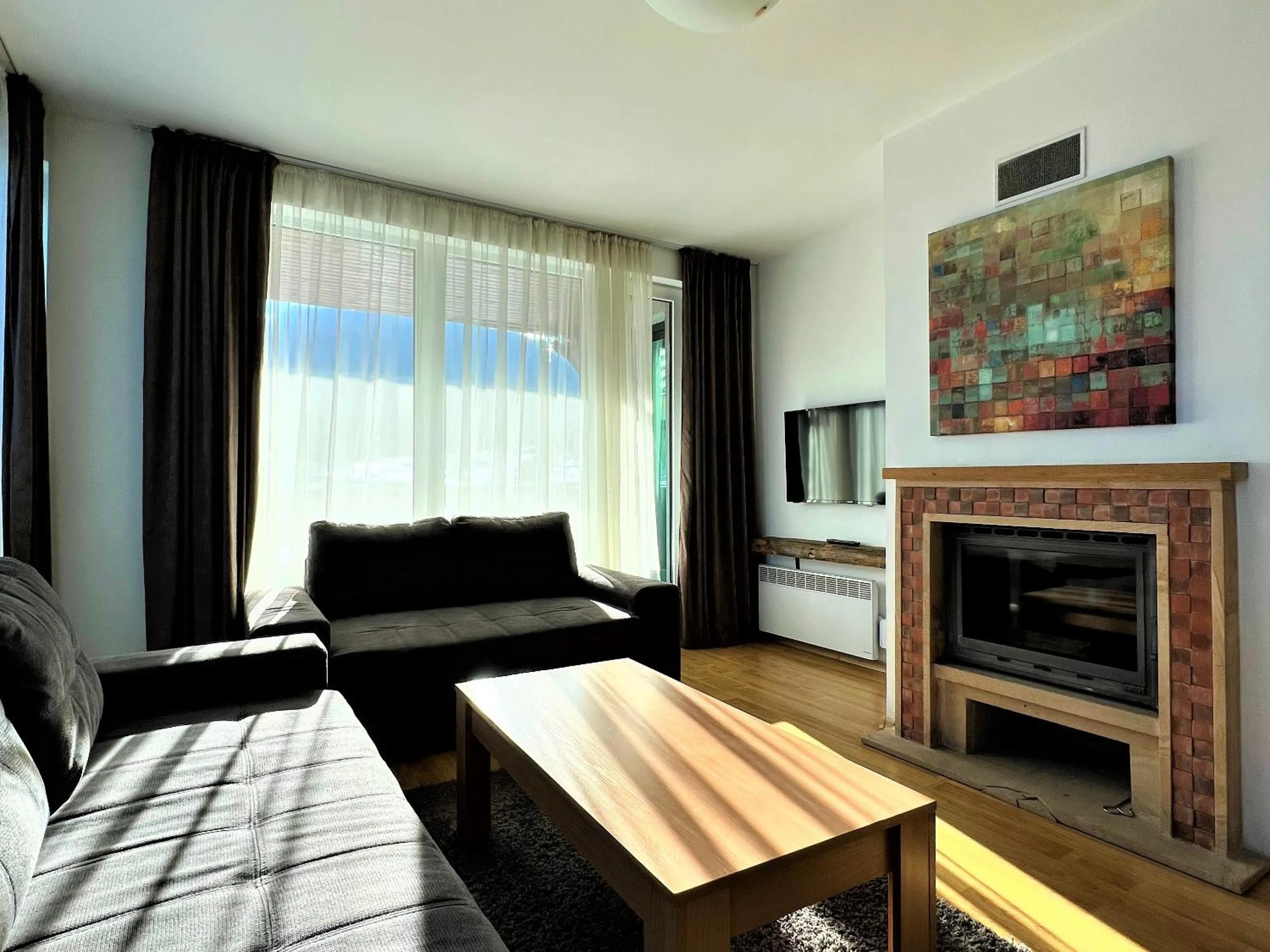 Communal lounge/ TV room in Local Stay Hotel, BW Signature Collection