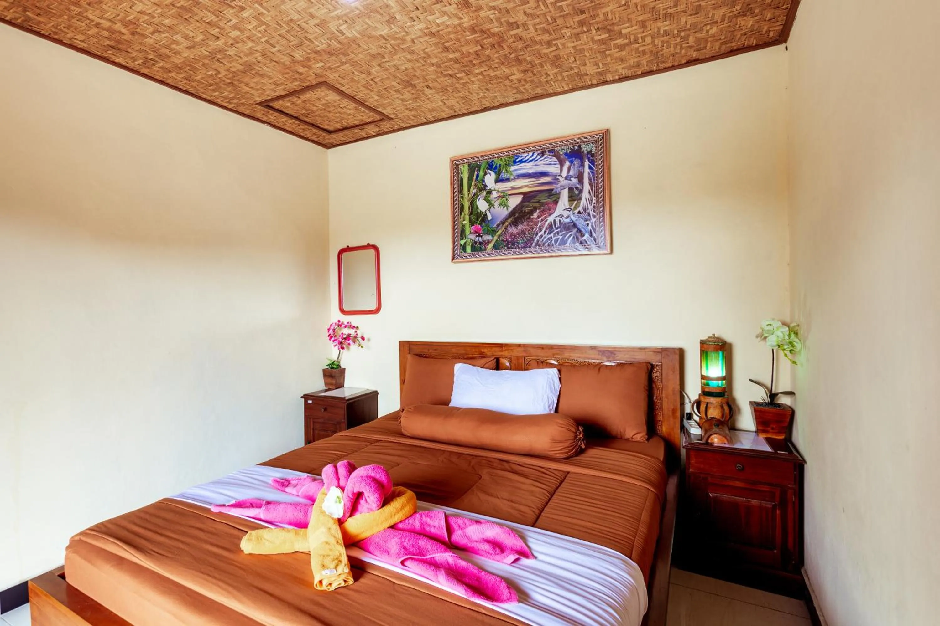 Bed in Batur Bamboo Cabin by ecommerceloka