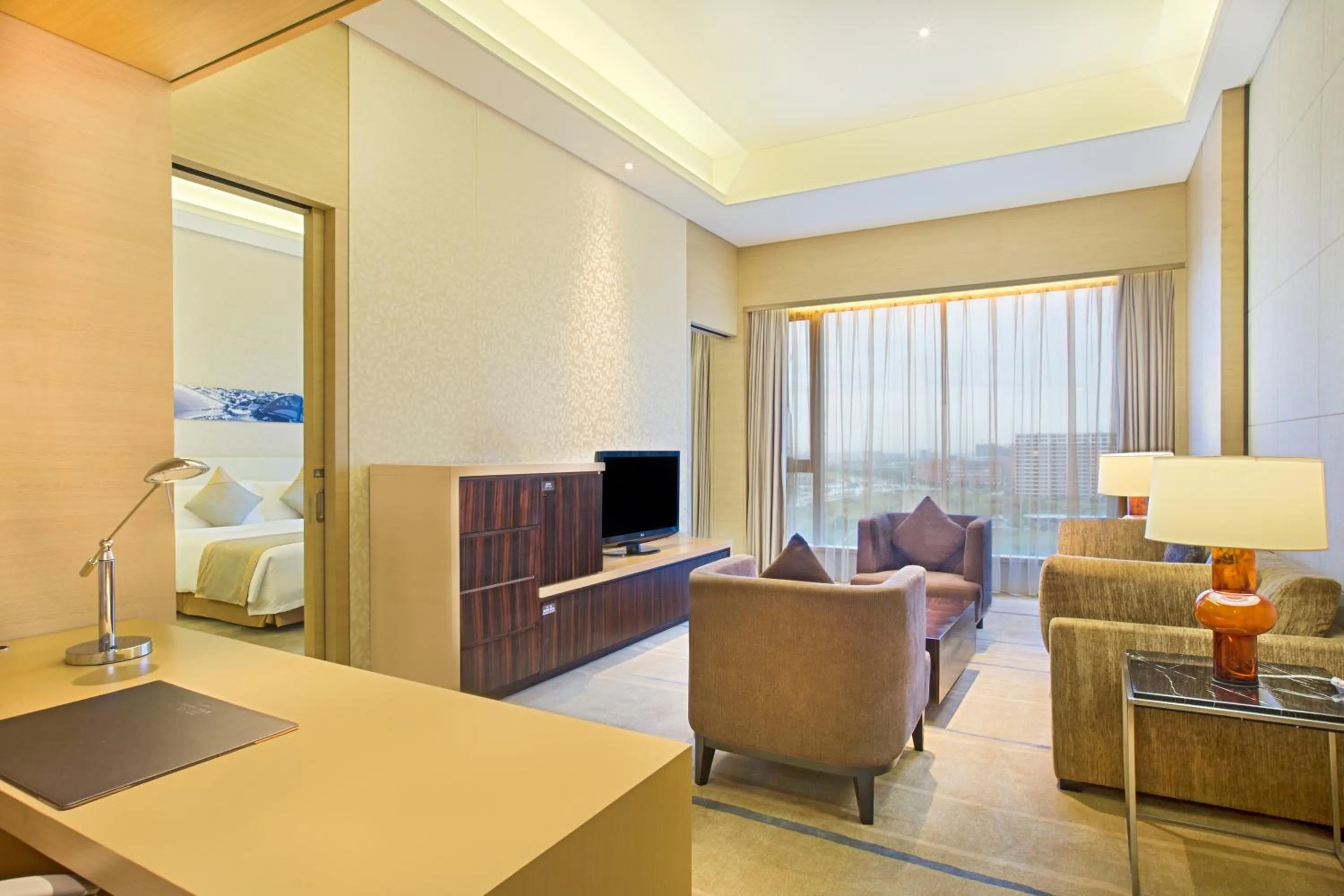 Living room, Bed in Crowne Plaza Guangzhou Huadu by IHG - Free Shuttle bus between hotel to Exhibition Center During Canton Fair