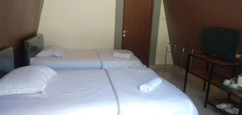 Bed in Bromo Camp House Bed in Bromo Camp House