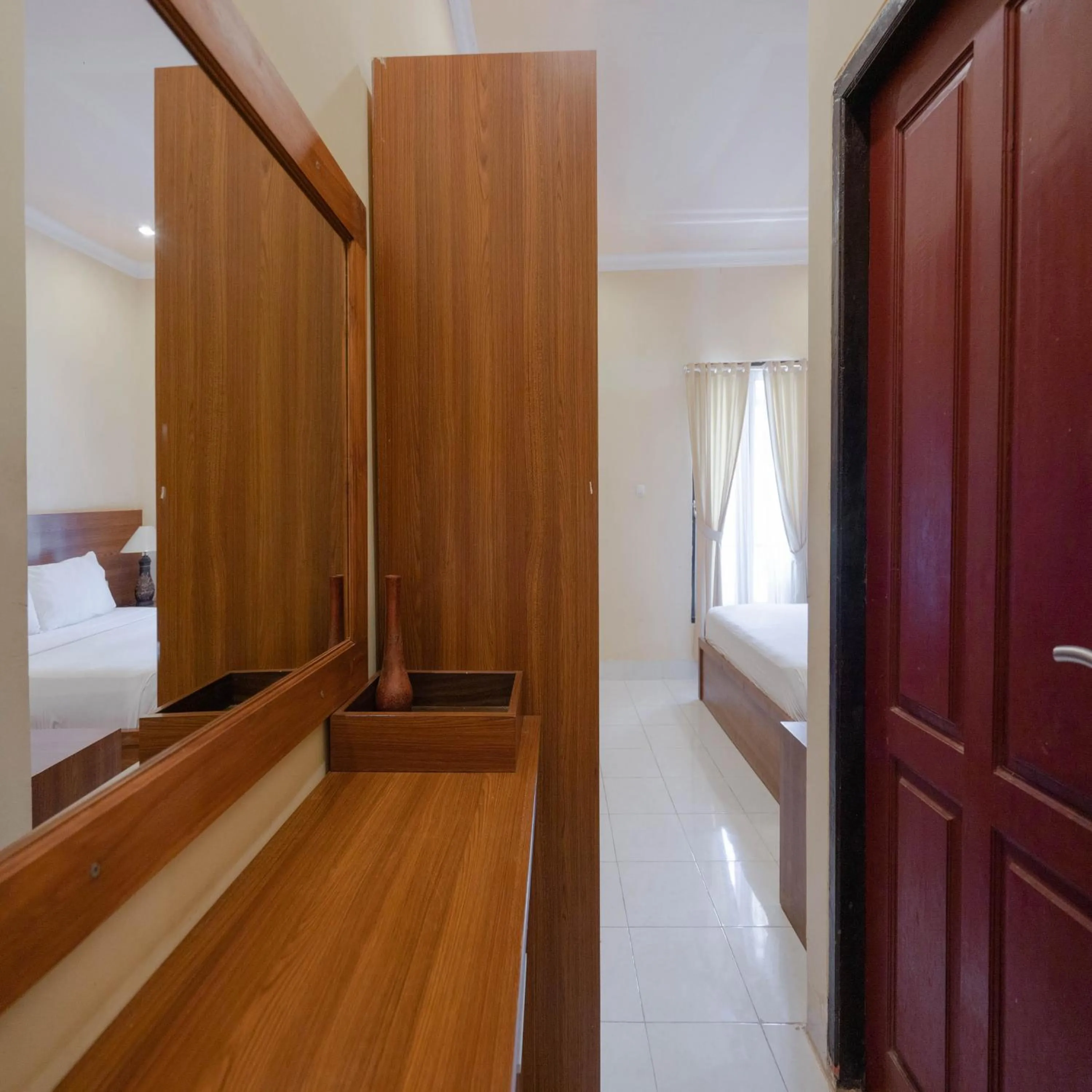 wardrobe, Bed in Urbanview My Home One Gili Trawangan