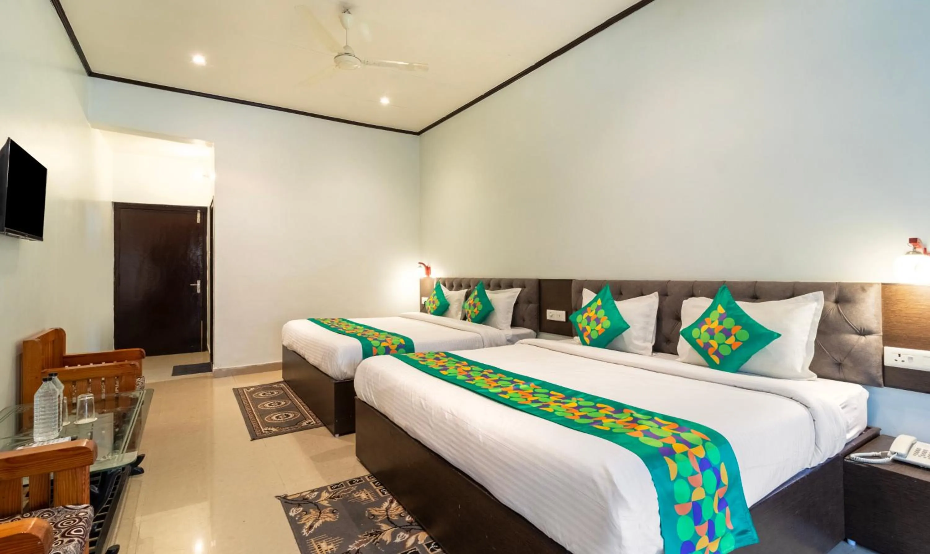 Bedroom, Bed in Treebo Spring Birds - Kainchi Dham