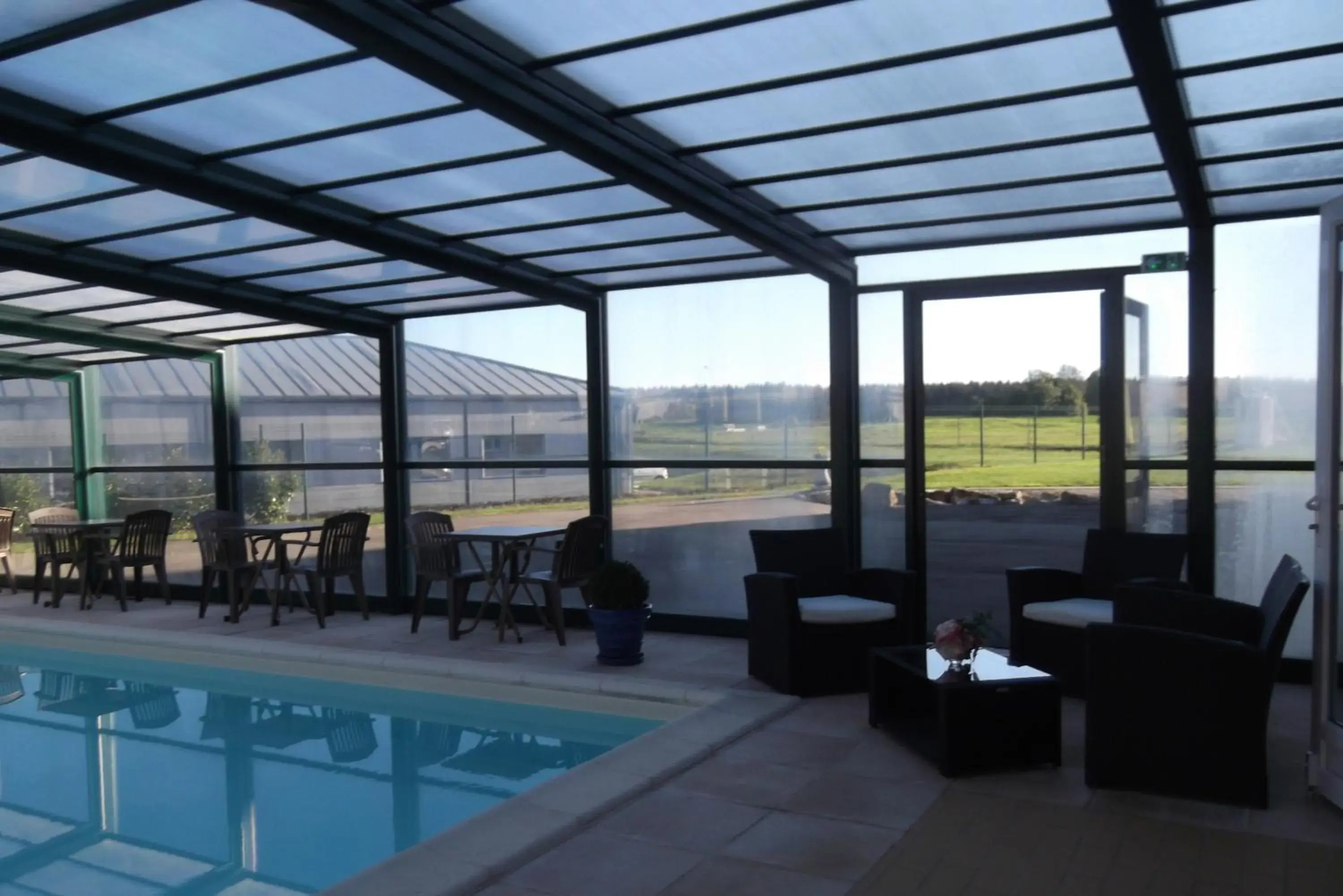 Swimming pool in Logis Jum'Hotel Swimming pool in Logis Jum'Hotel