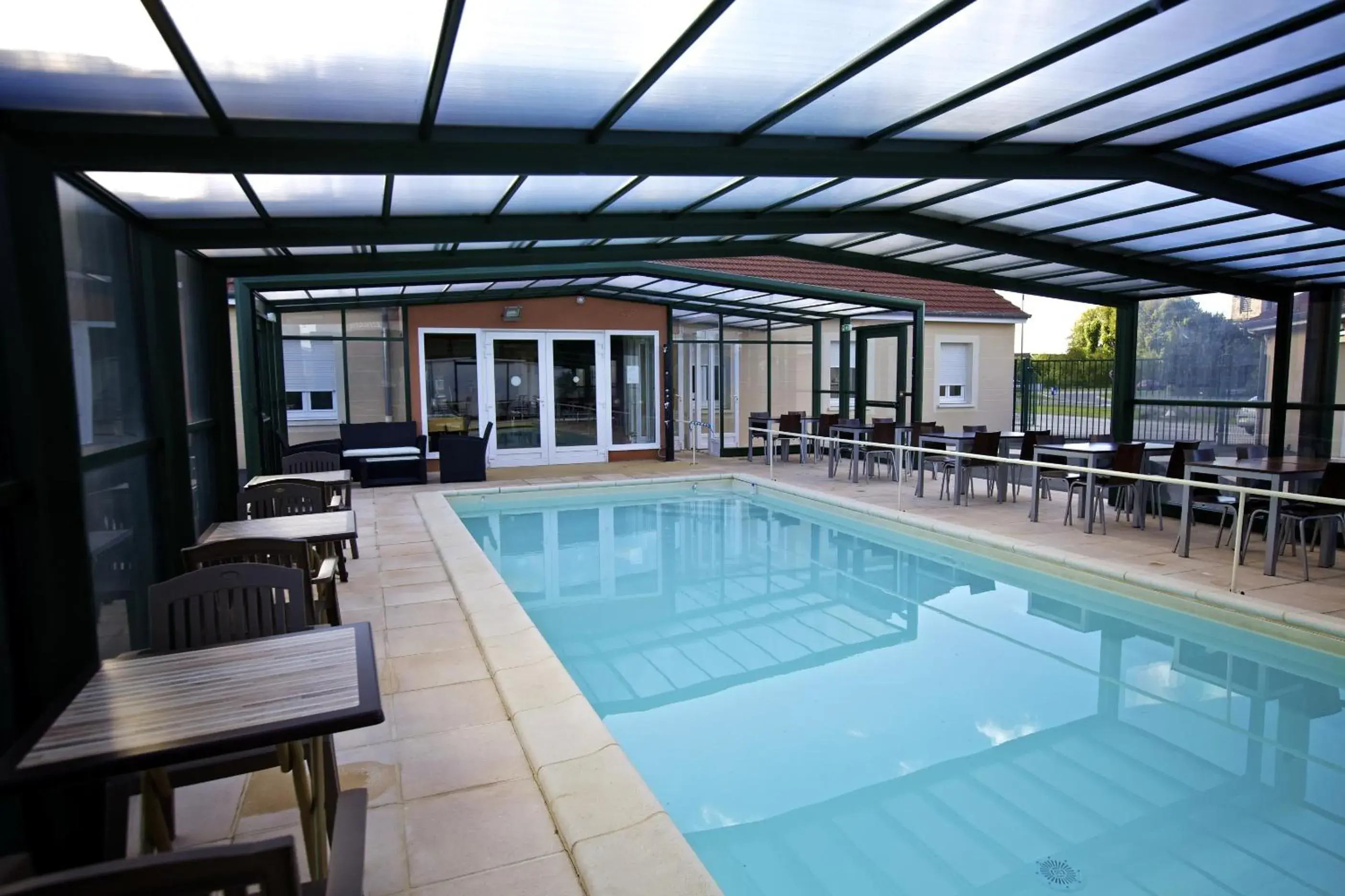 Swimming pool in Logis Jum'Hotel Swimming pool in Logis Jum'Hotel