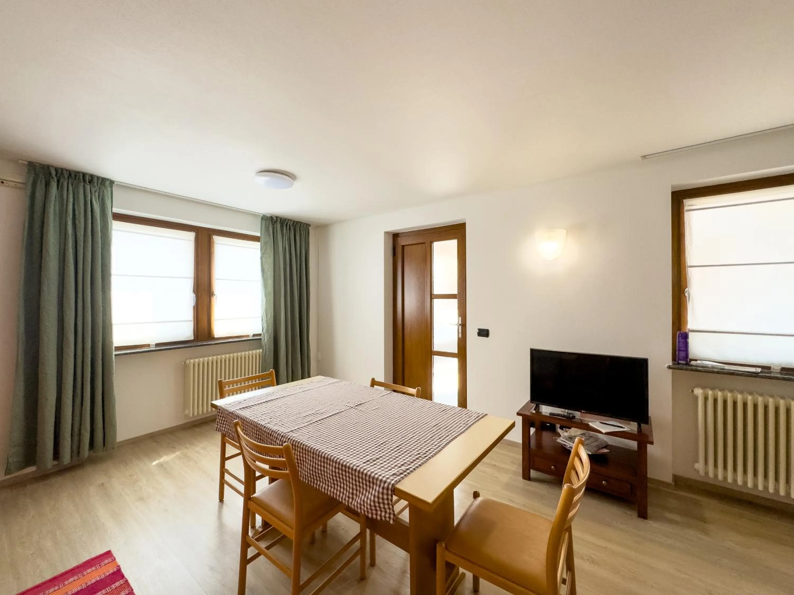 Communal lounge/ TV room in Hotel Belvedere Wellness&SPA