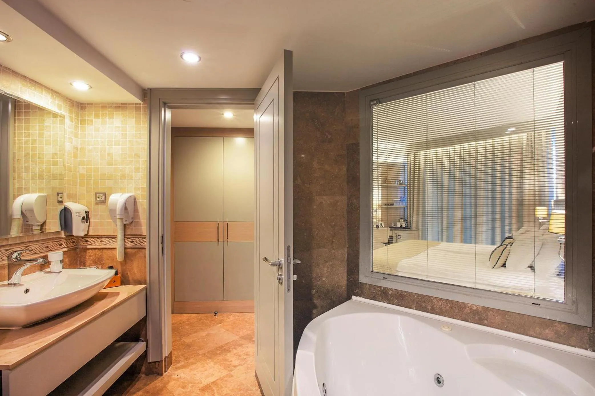 Bathroom in Charisma De Luxe Hotel