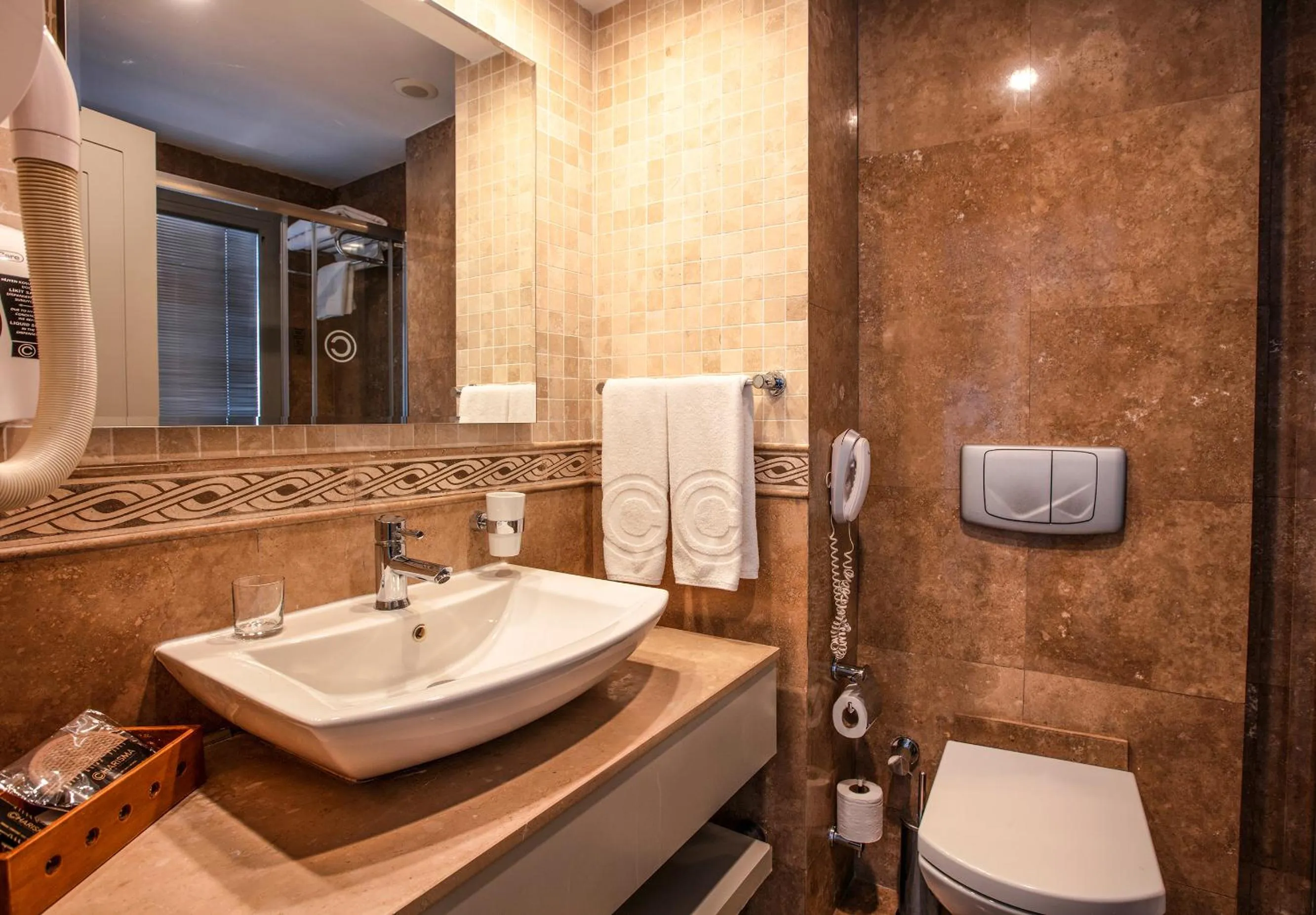 Bathroom in Charisma De Luxe Hotel