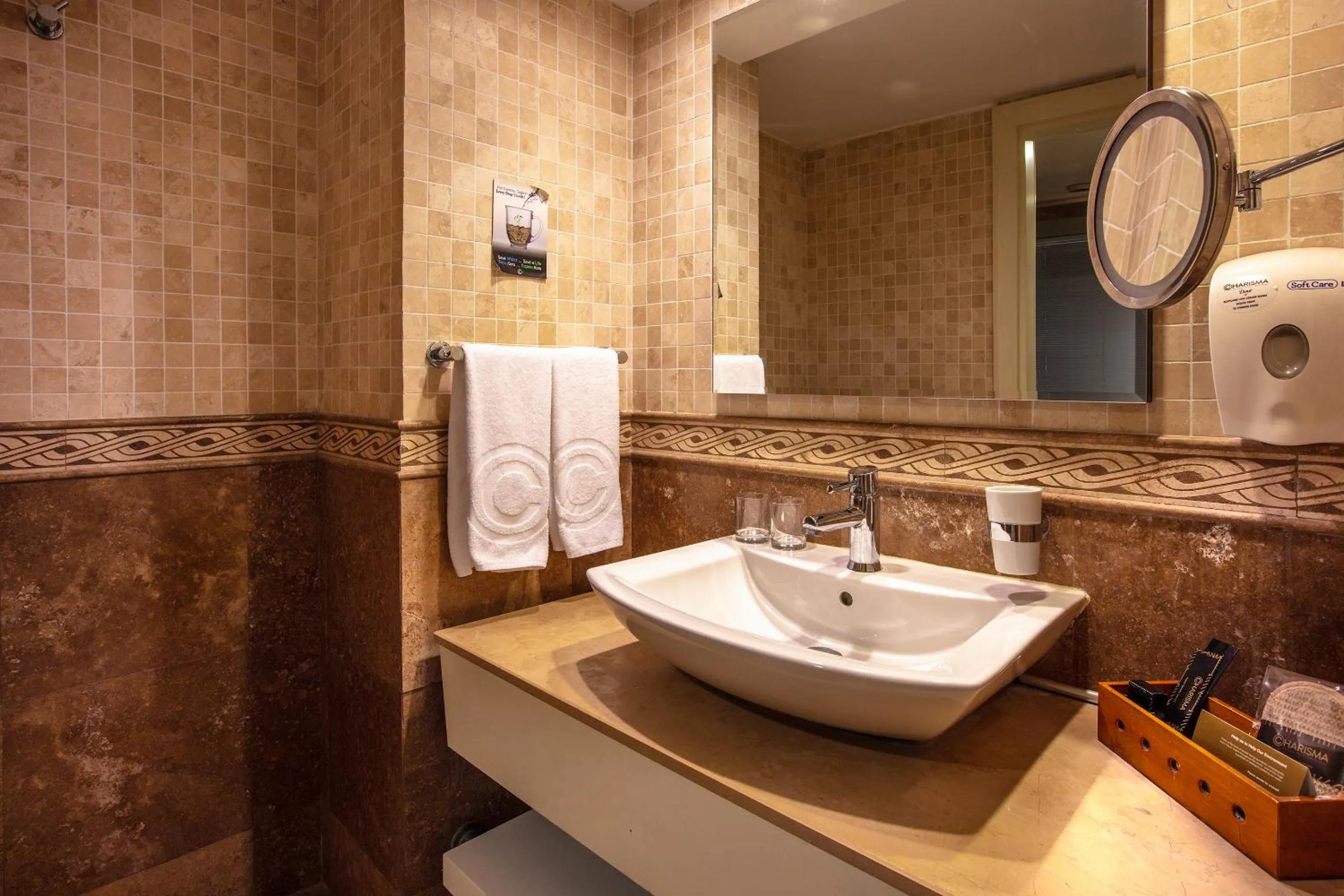 Bathroom in Charisma De Luxe Hotel