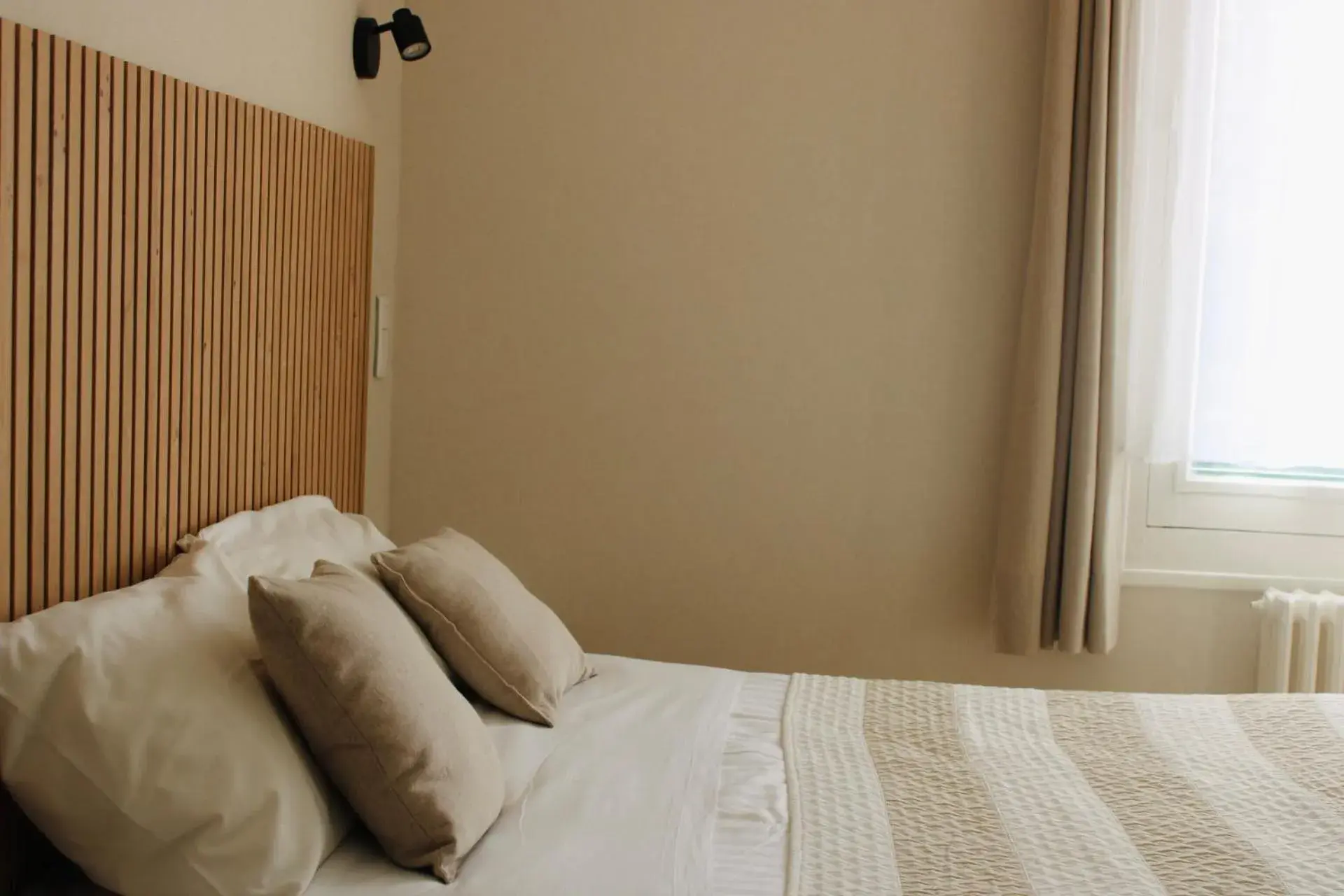 Bed in Logis Hôtel L'Ayguelade Bed in Logis Hôtel L'Ayguelade