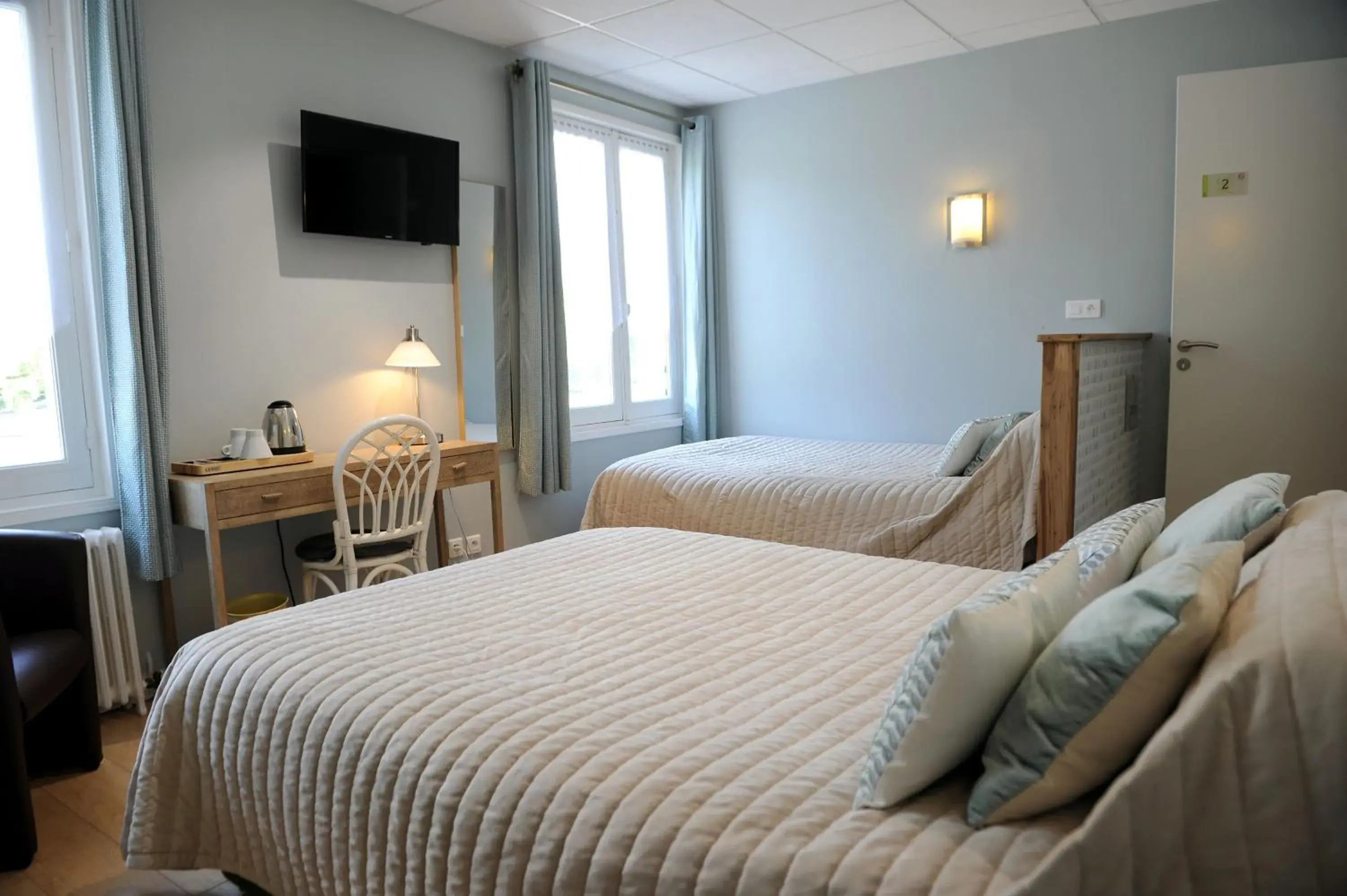 Photo of the whole room, Bed in Logis Hôtel L'Ayguelade Photo of the whole room, Bed in Logis Hôtel L'Ayguelade