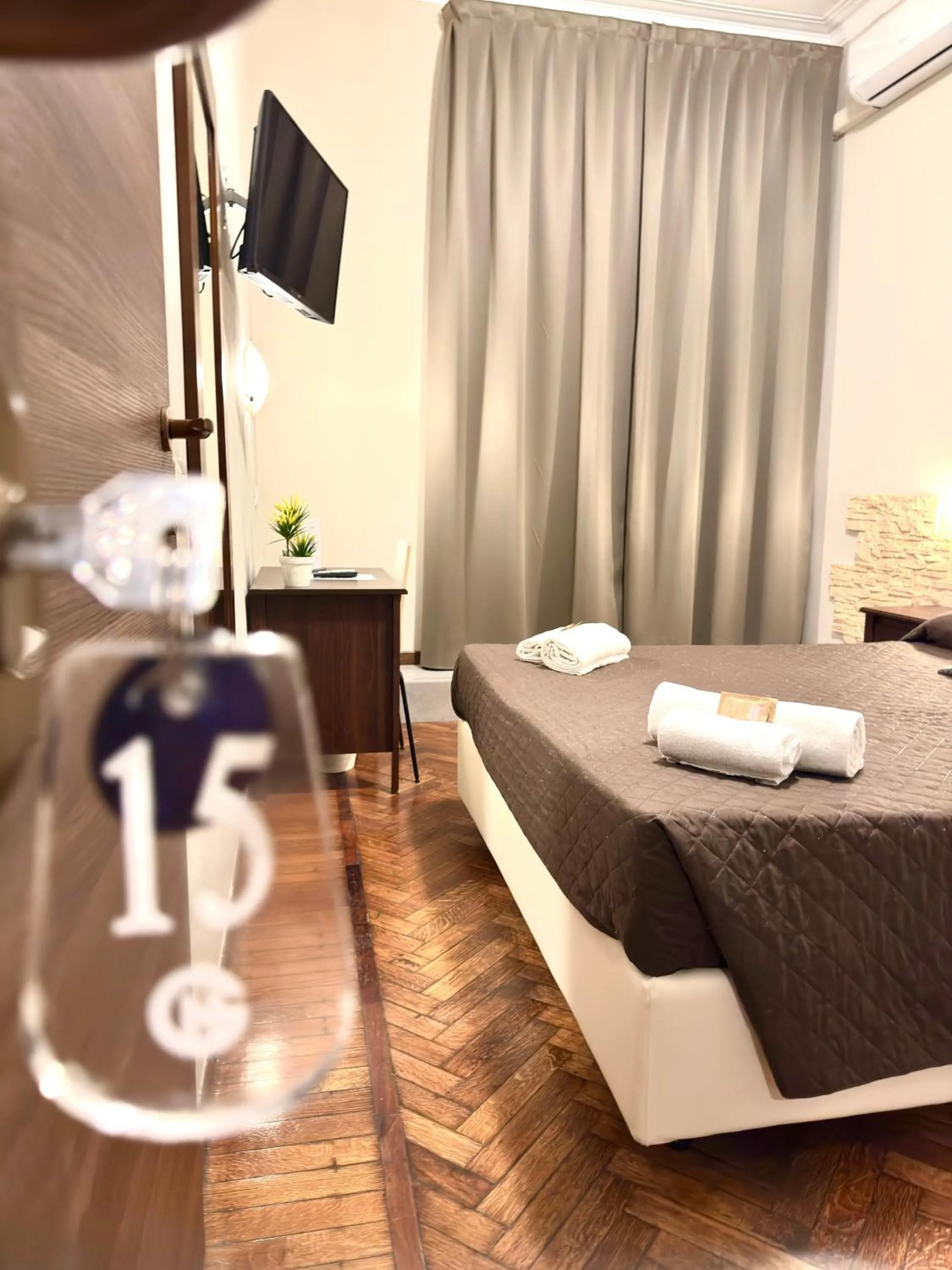 Bed in Carlo Goldoni Hotel