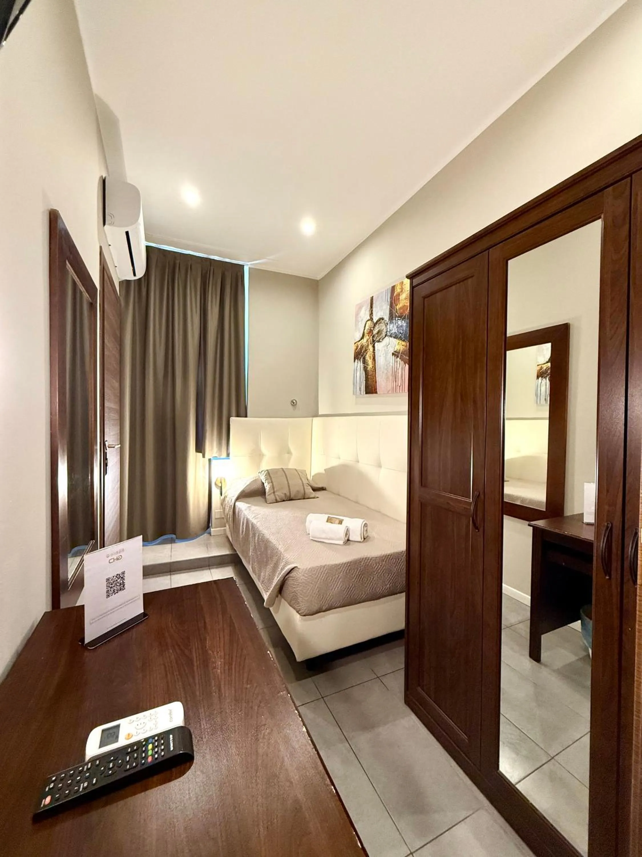 Bed in Carlo Goldoni Hotel