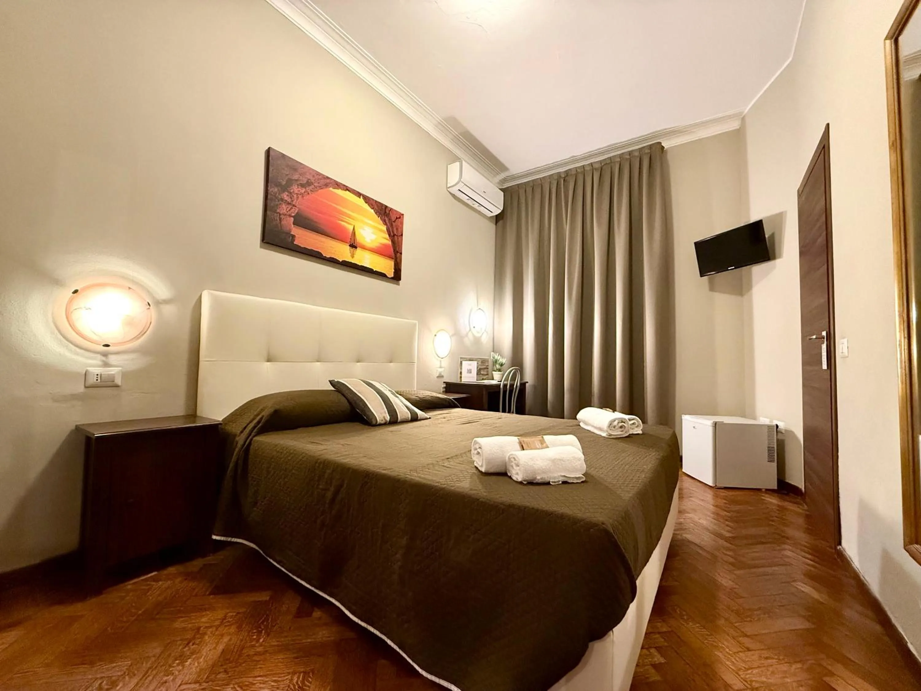 Bed in Carlo Goldoni Hotel