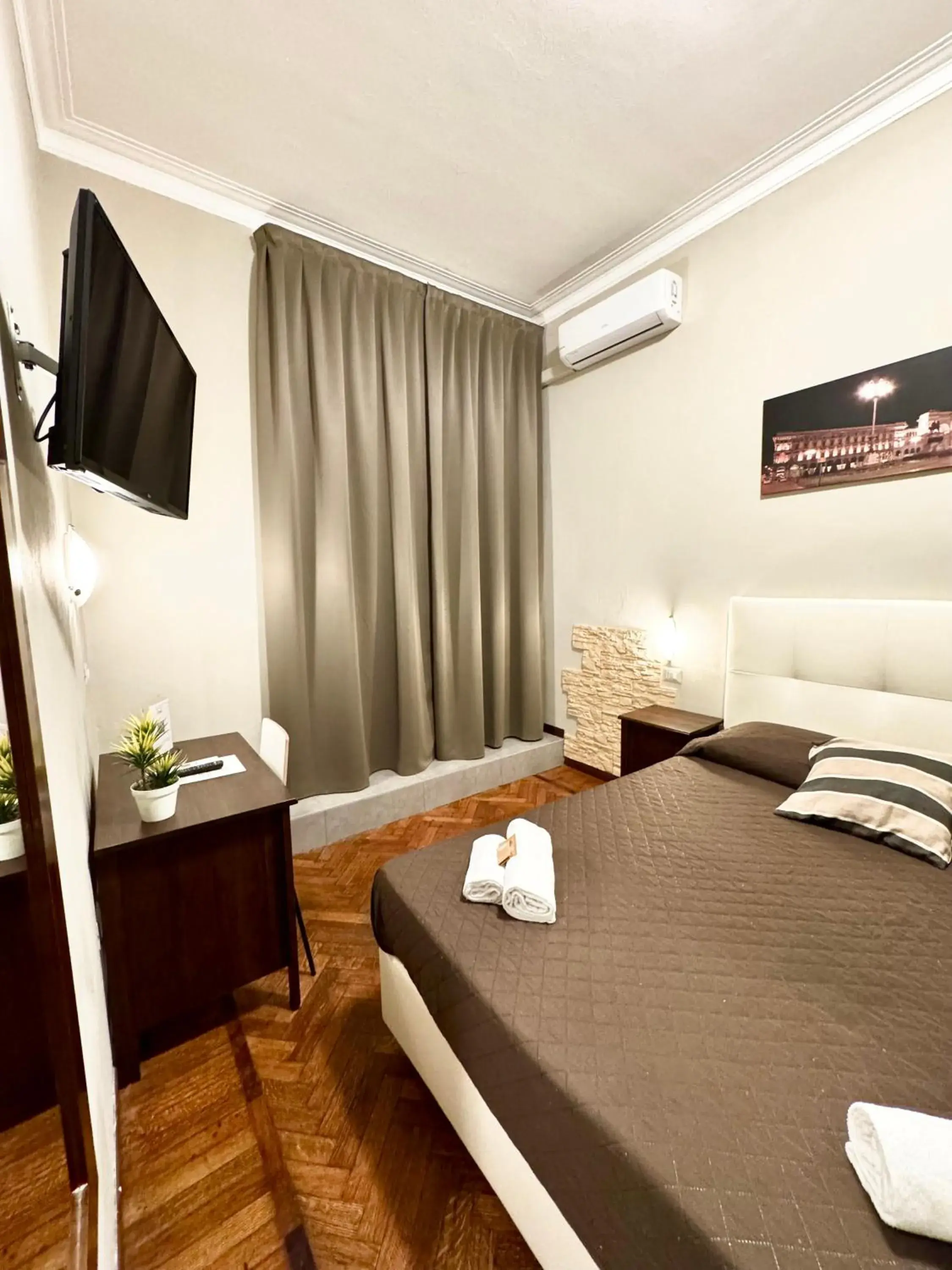 Bed in Carlo Goldoni Hotel Bed in Carlo Goldoni Hotel