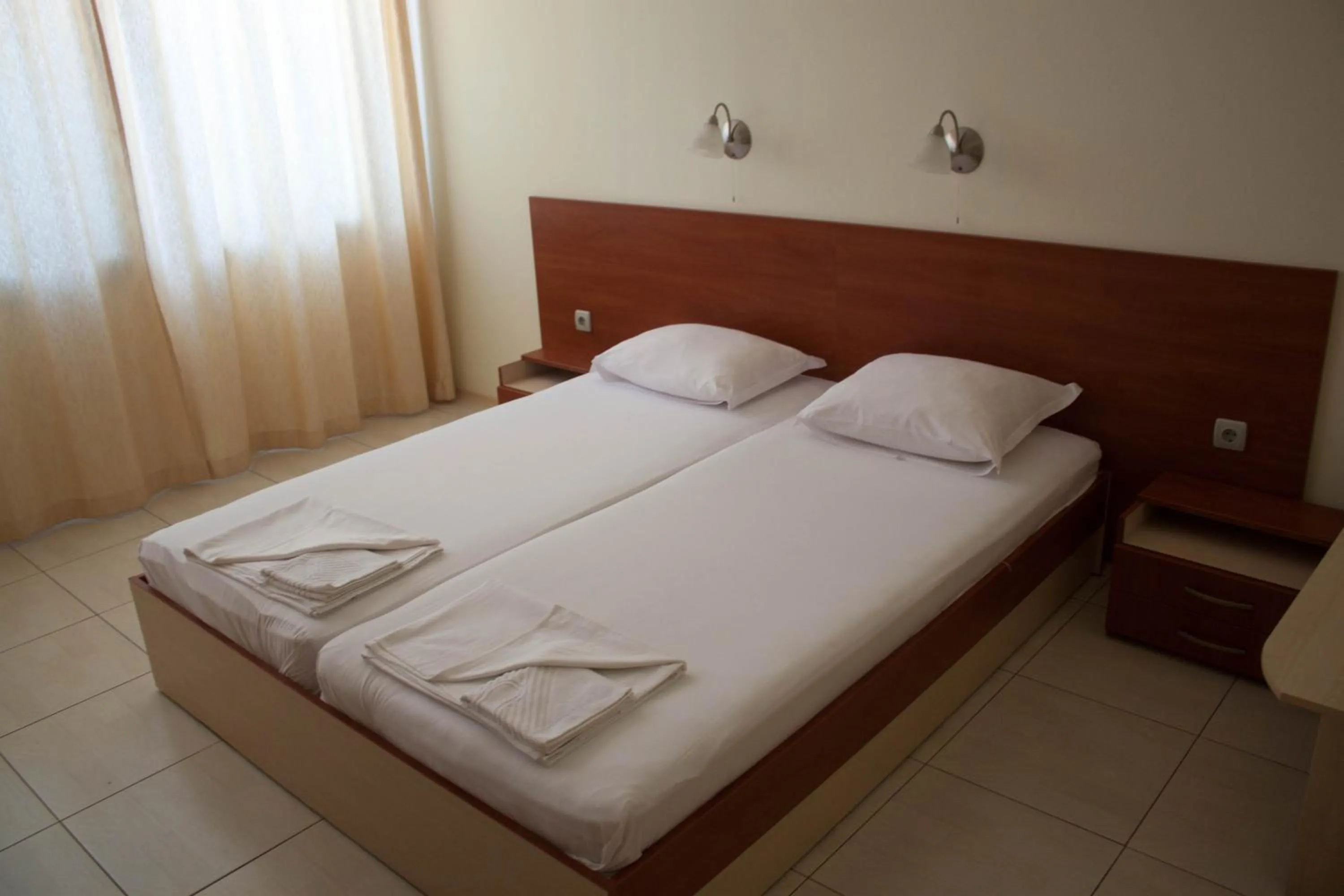 Bed in Gardenia Vacation Settlement