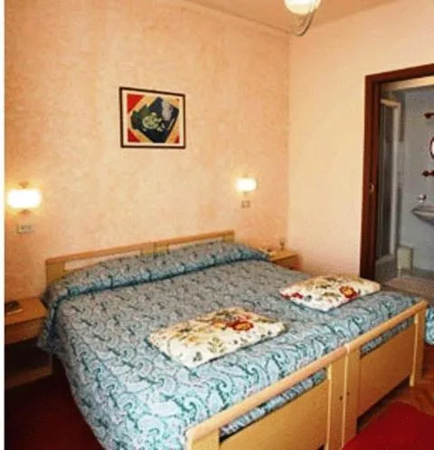 Bed in Hotel Elena