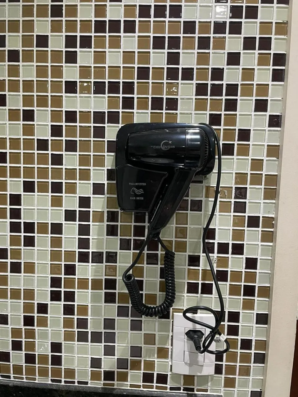 hair dryier in Park Tower Campinas Residence by Nacional Inn