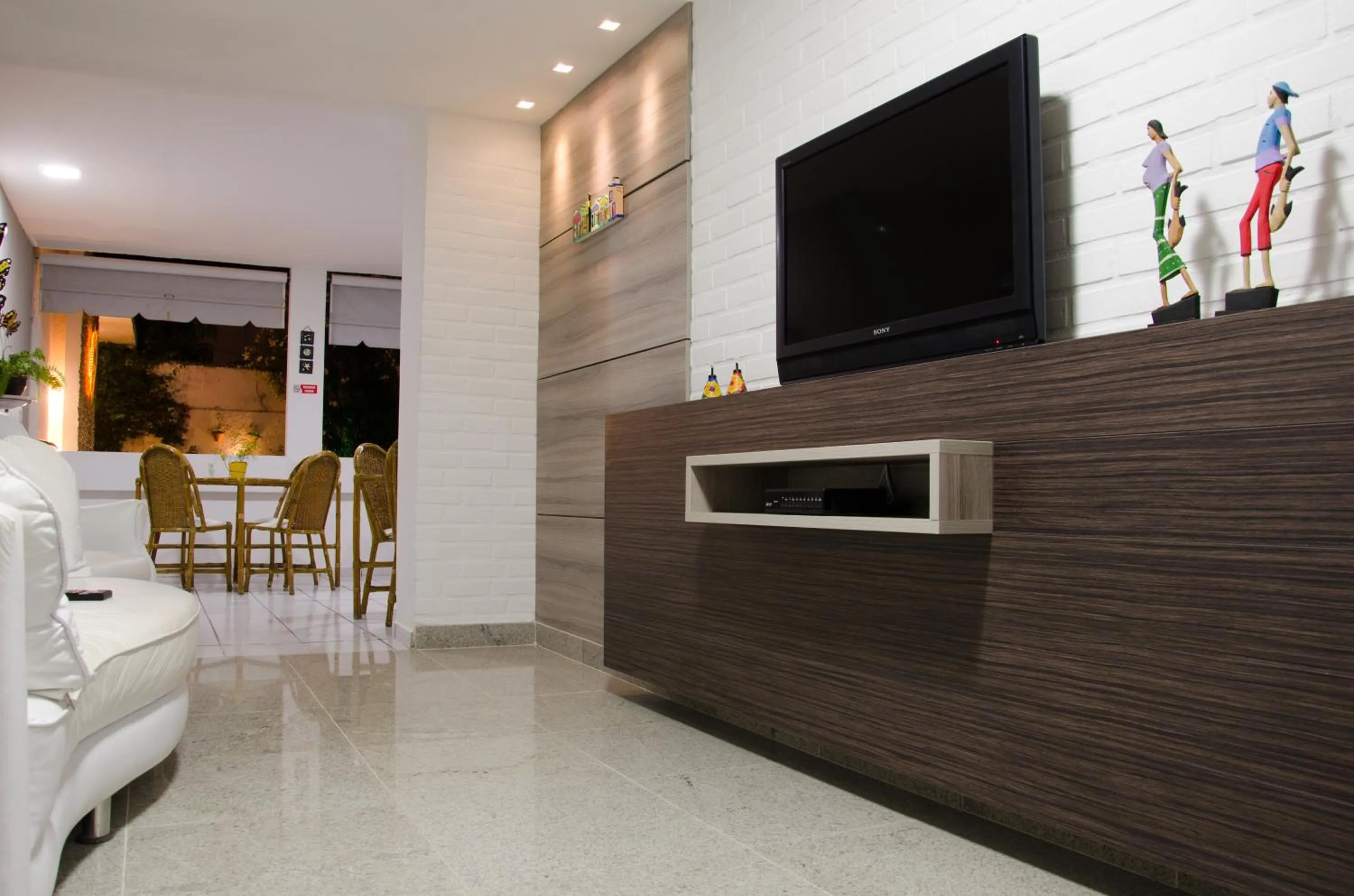 Communal lounge/ TV room in Hotel Pousada Da Sereia