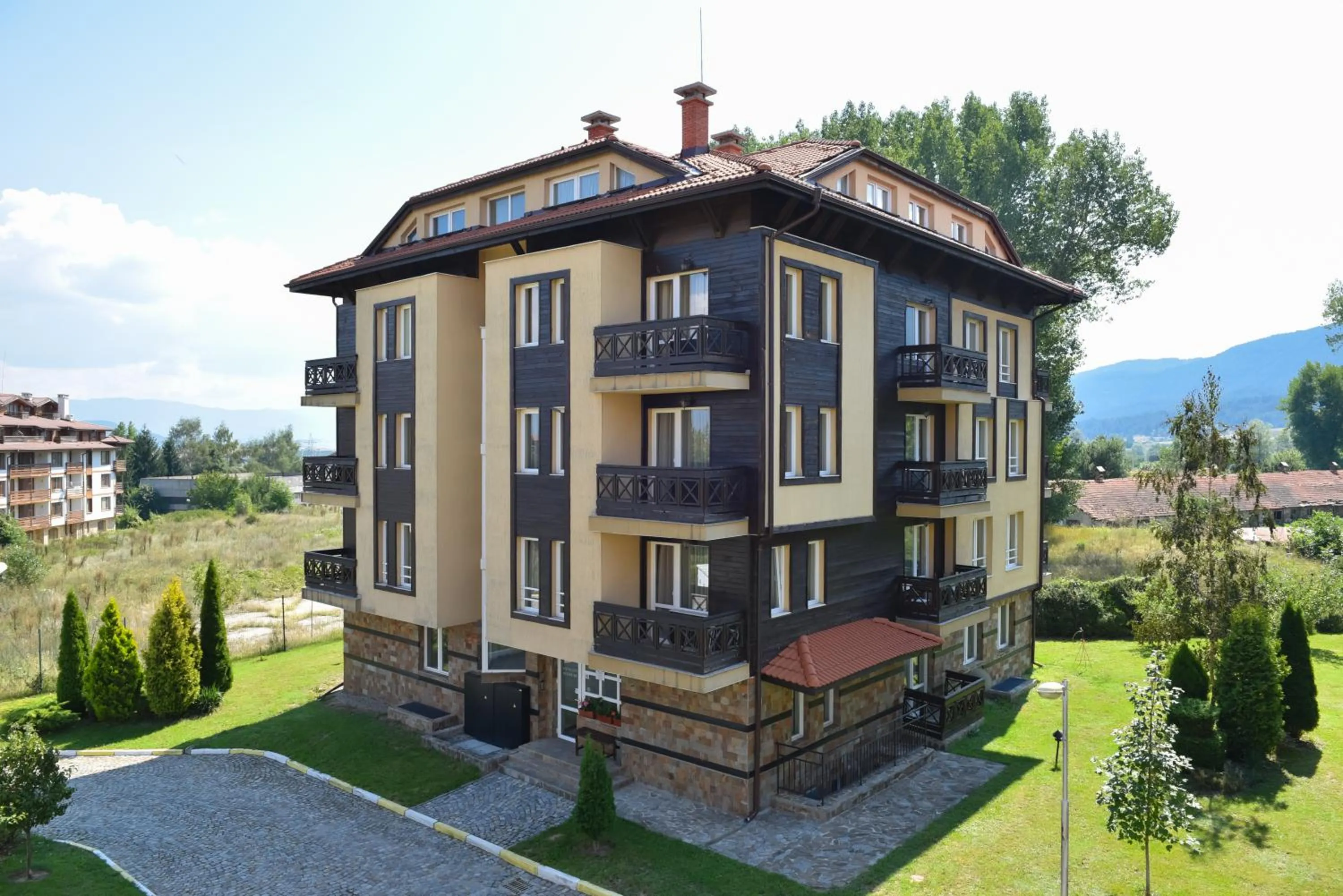 Property building in Hotel Bojur & Bojurland Apartment Complex