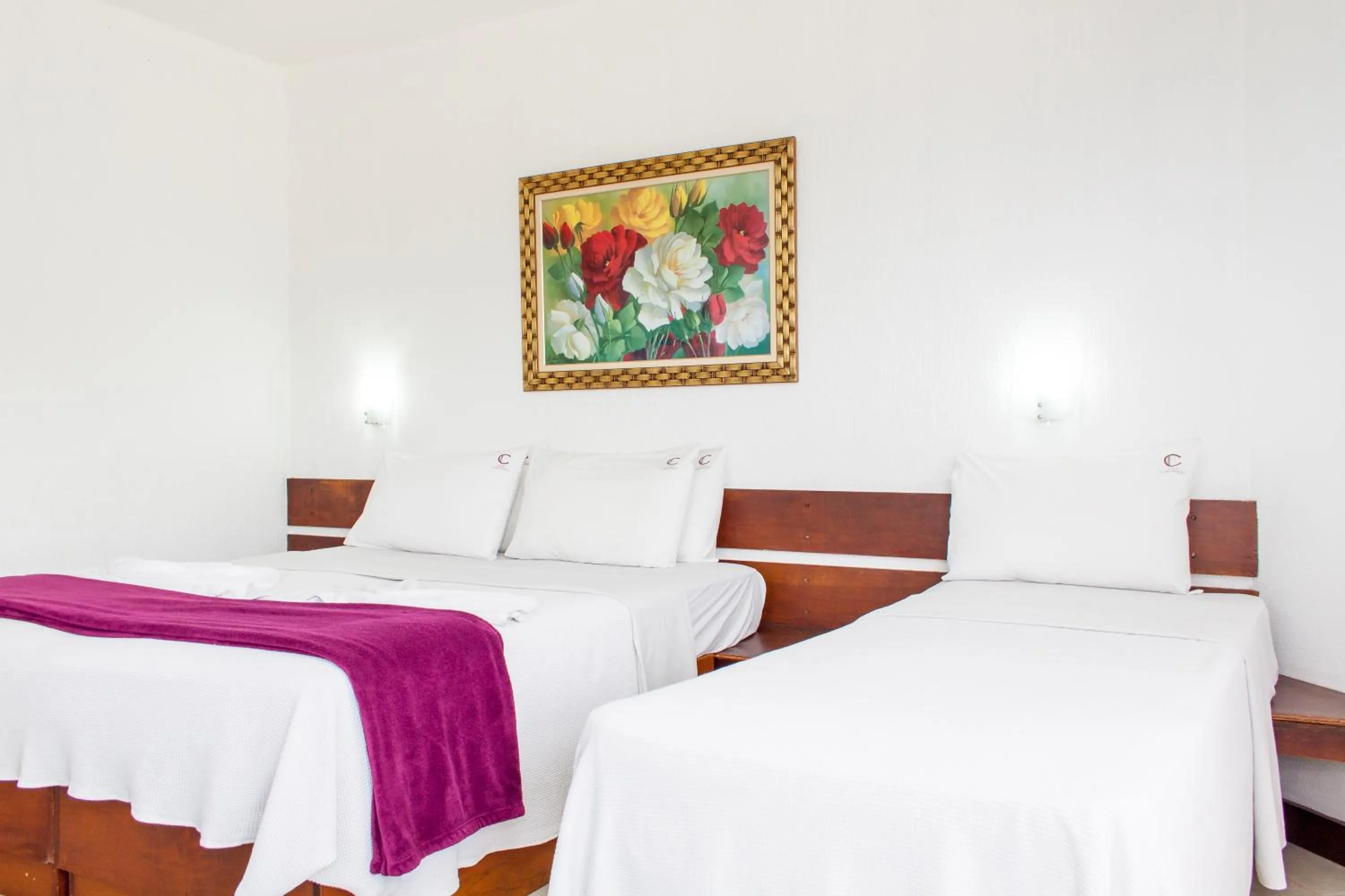 Bed in Coronado Inn Hotel