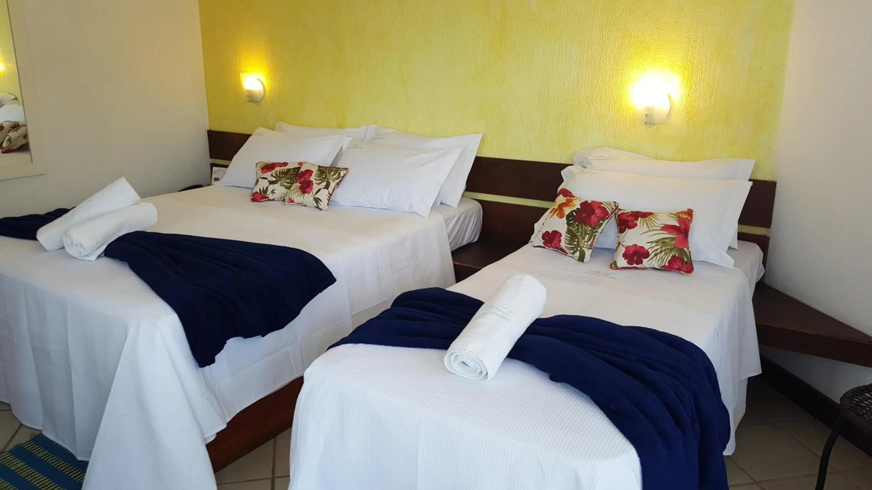 Bed in Coronado Inn Hotel