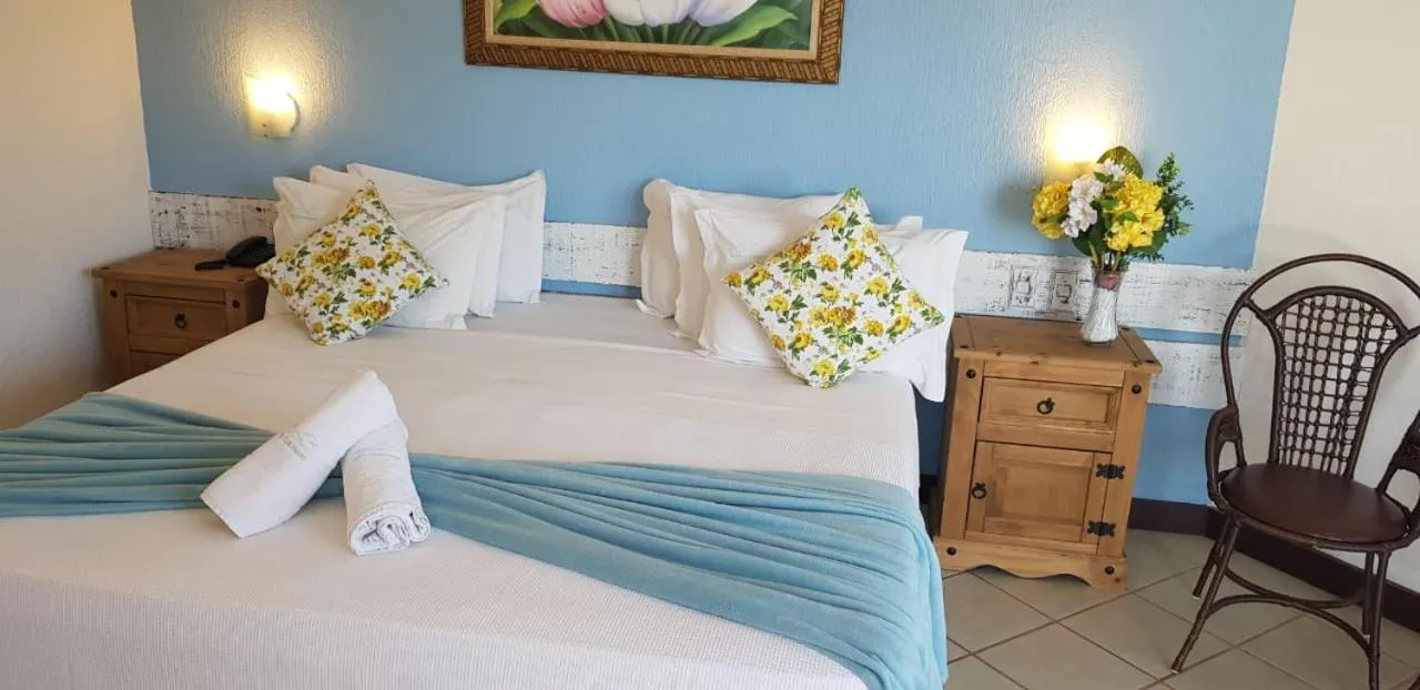 Bed in Coronado Inn Hotel