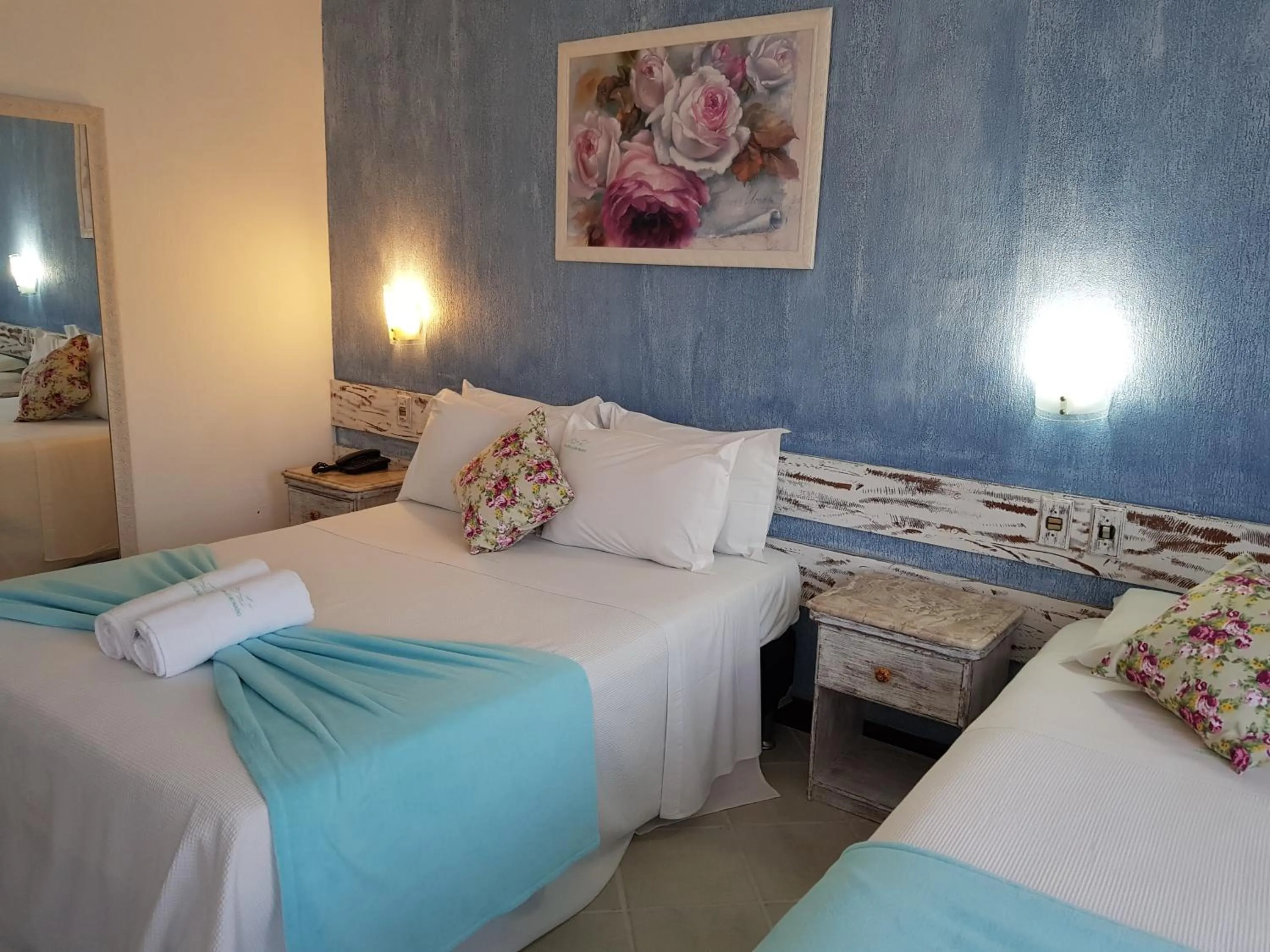 Bed in Coronado Inn Hotel