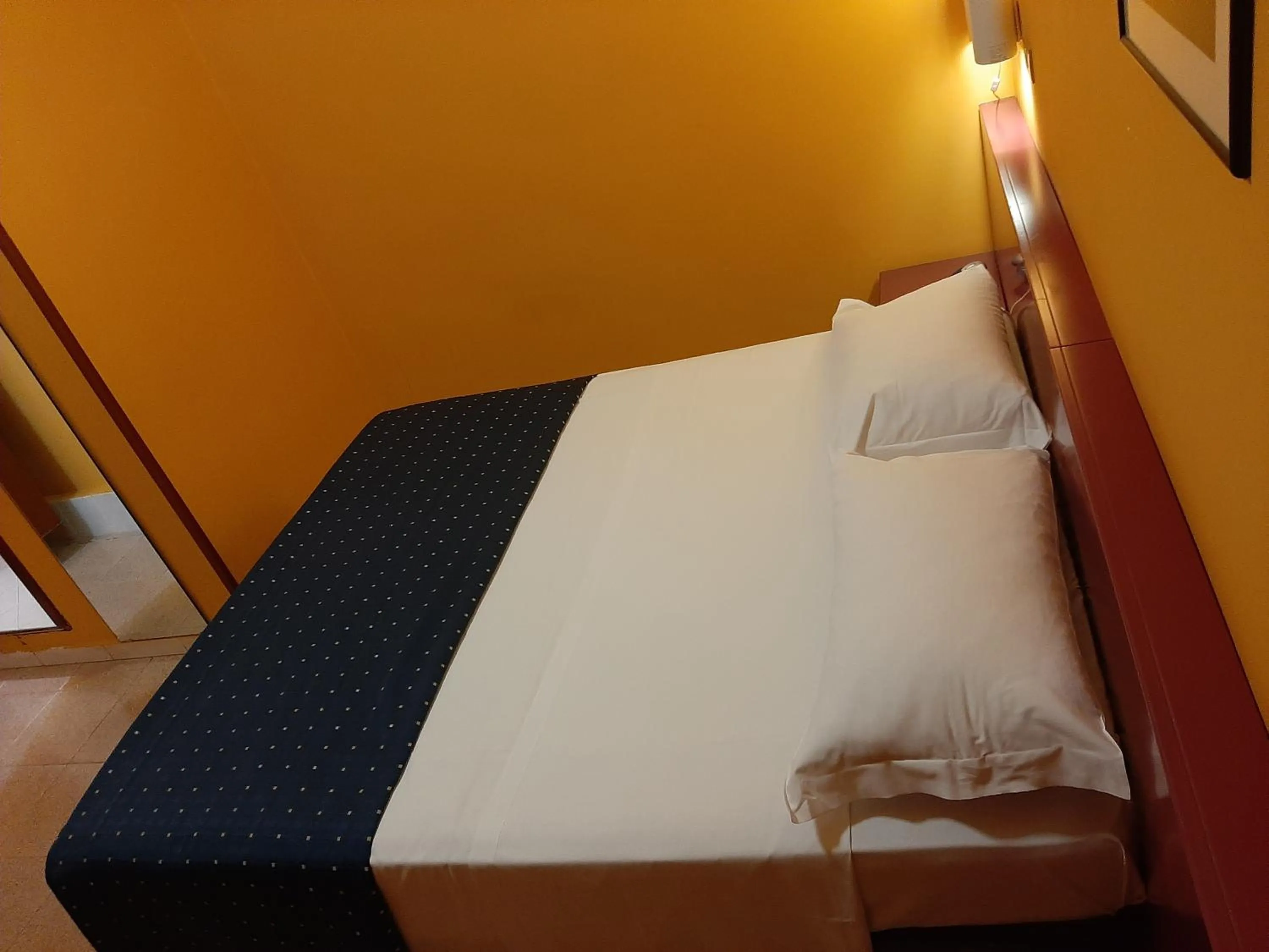 Bed in Cristal Hotel