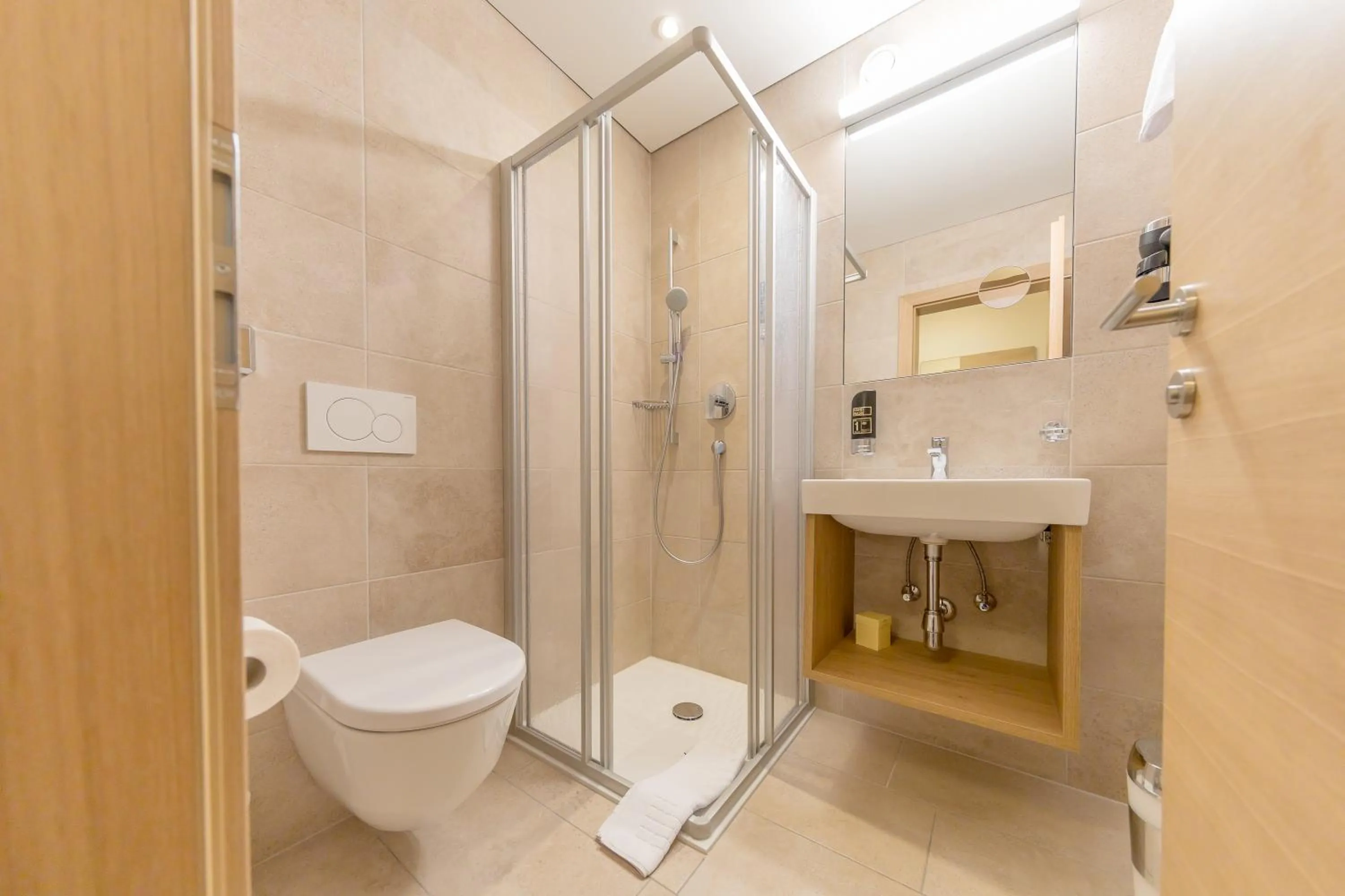 Shower in KOSIS Sports Lifestyle Hotel