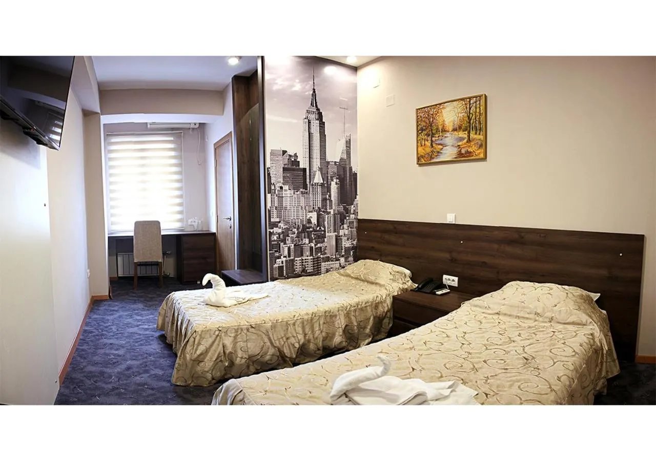 Bed in Hotel Ambasador