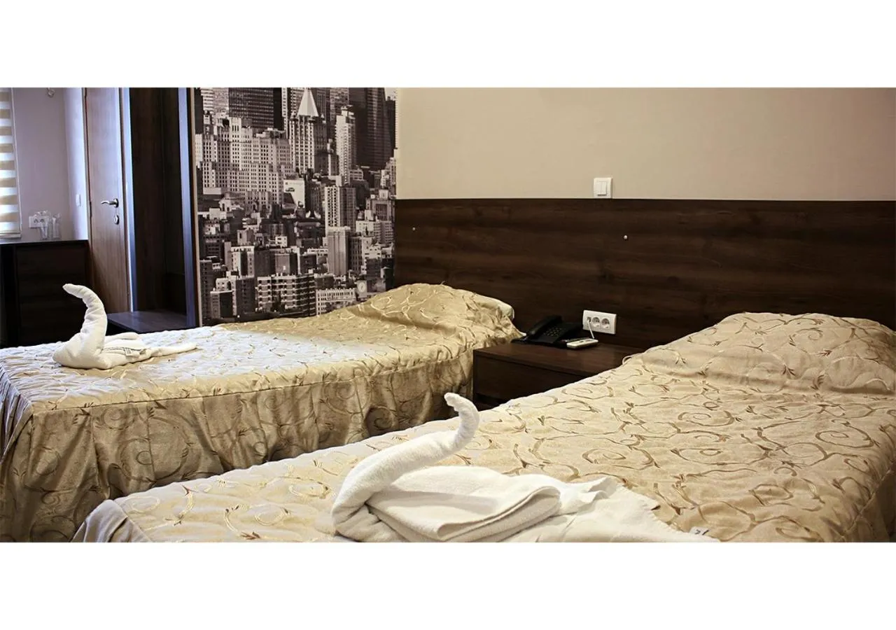 Bed in Hotel Ambasador