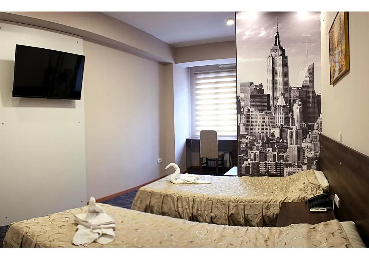 Bed in Hotel Ambasador