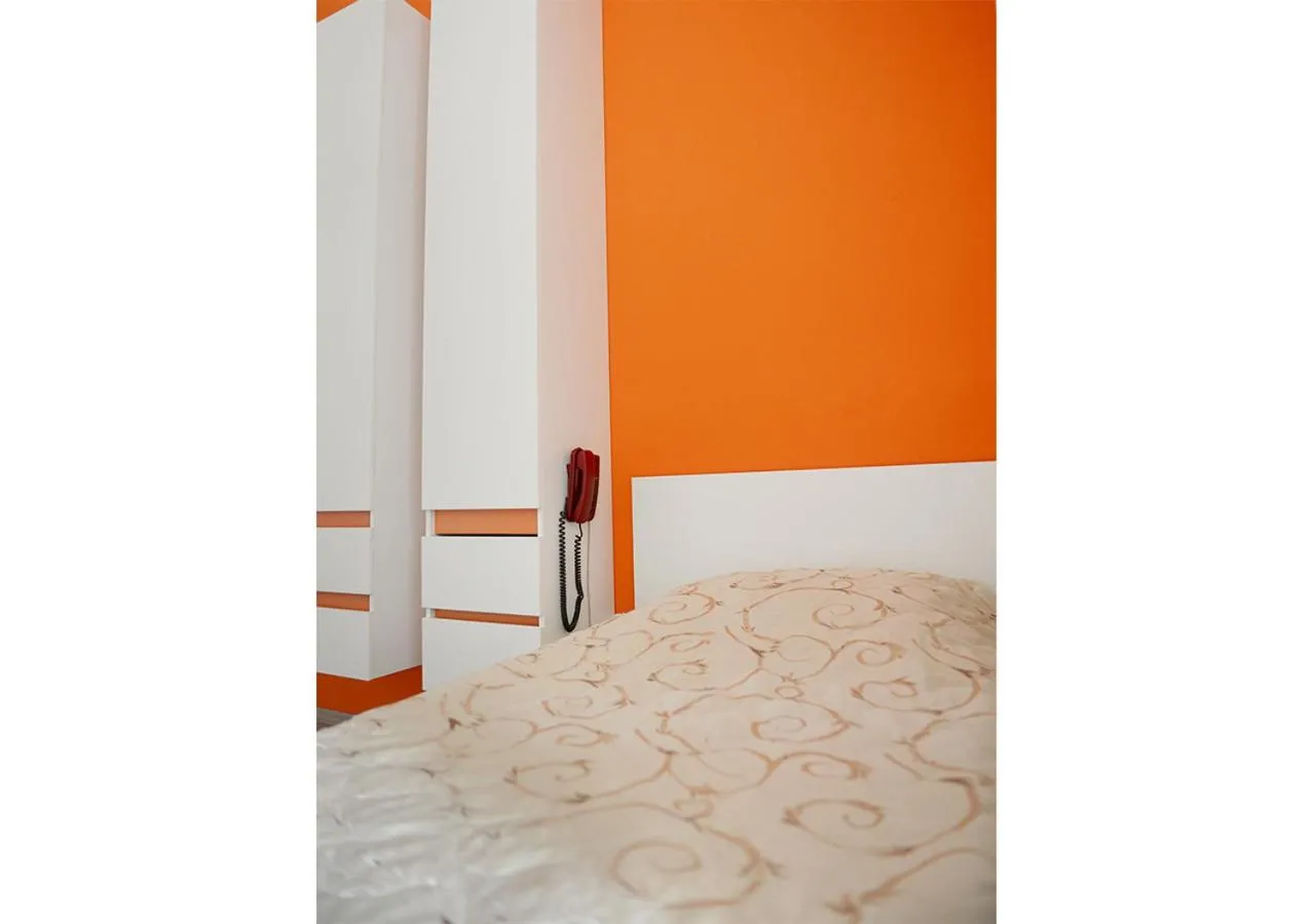 Bed in Hotel Ambasador