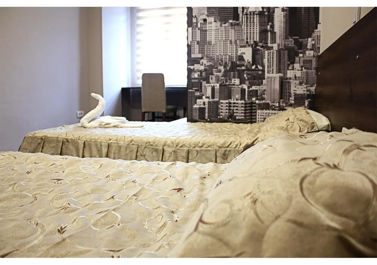 Bed in Hotel Ambasador