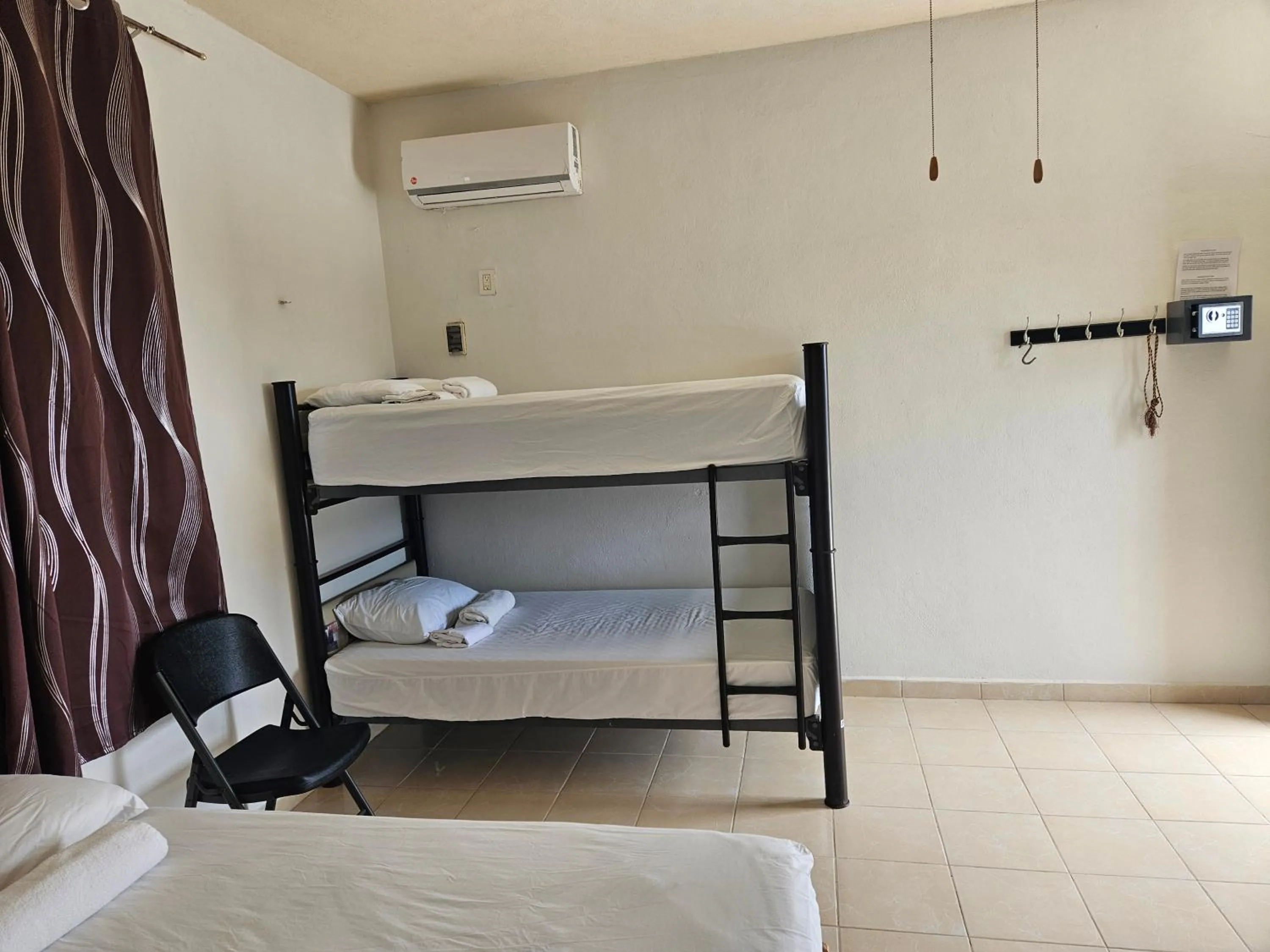 Photo of the whole room, Bed in El Padrino