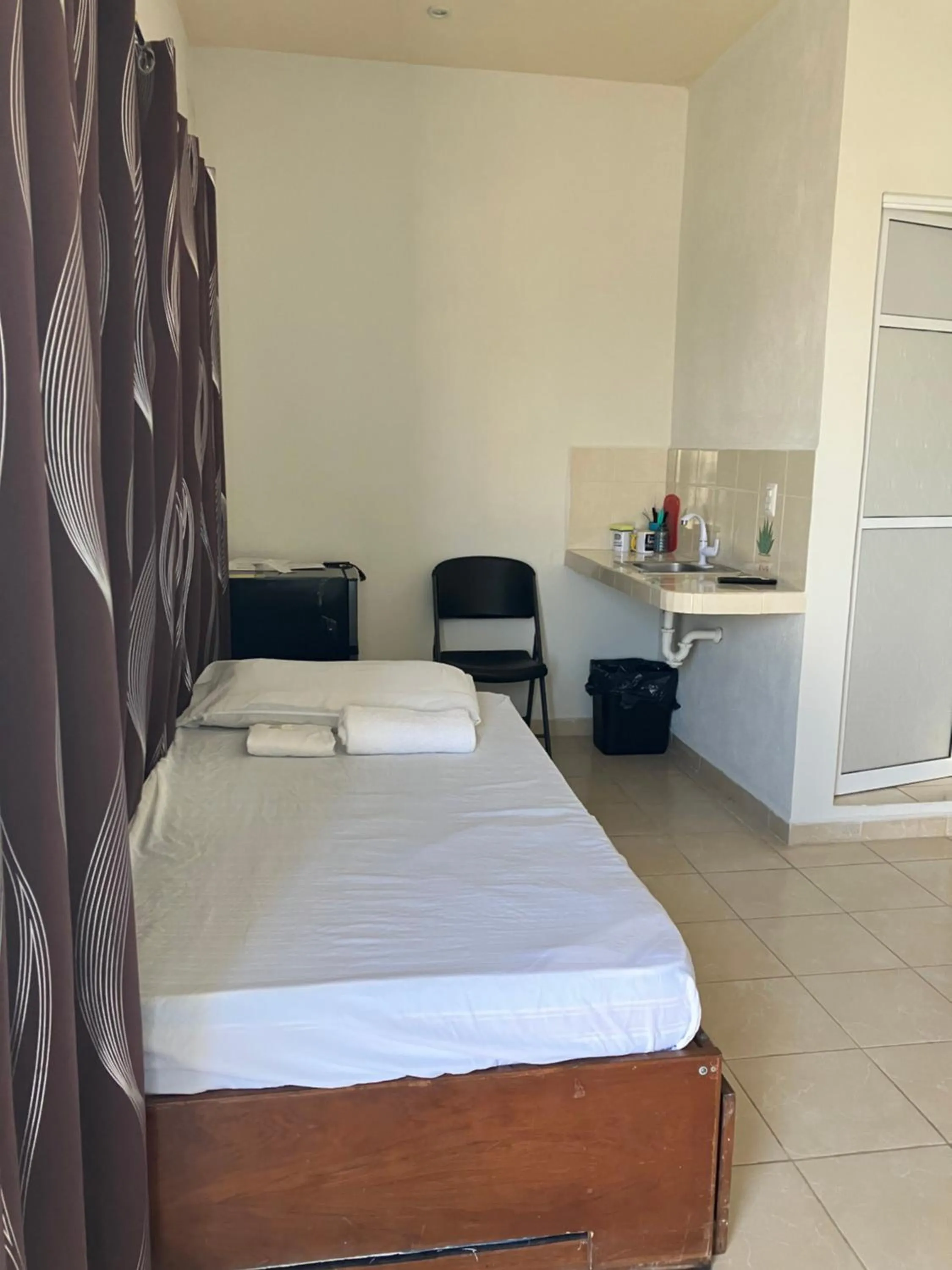 Photo of the whole room, Bed in El Padrino