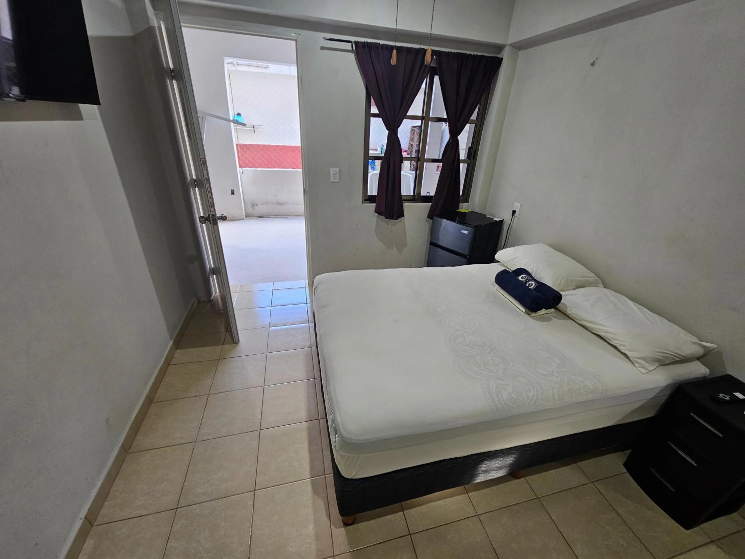 Photo of the whole room, Bed in El Padrino