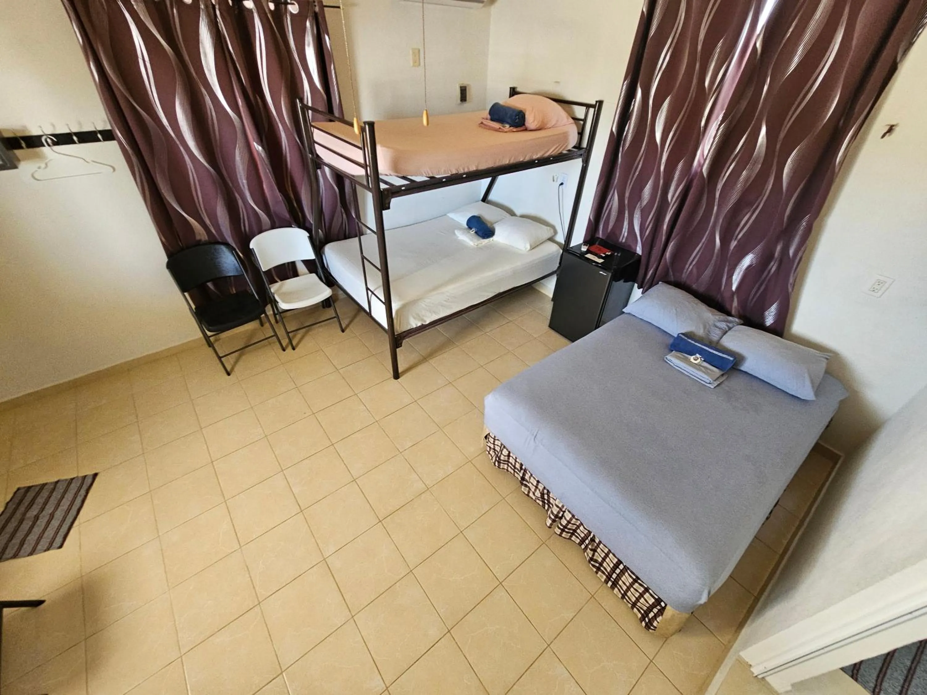 Photo of the whole room, Bed in El Padrino