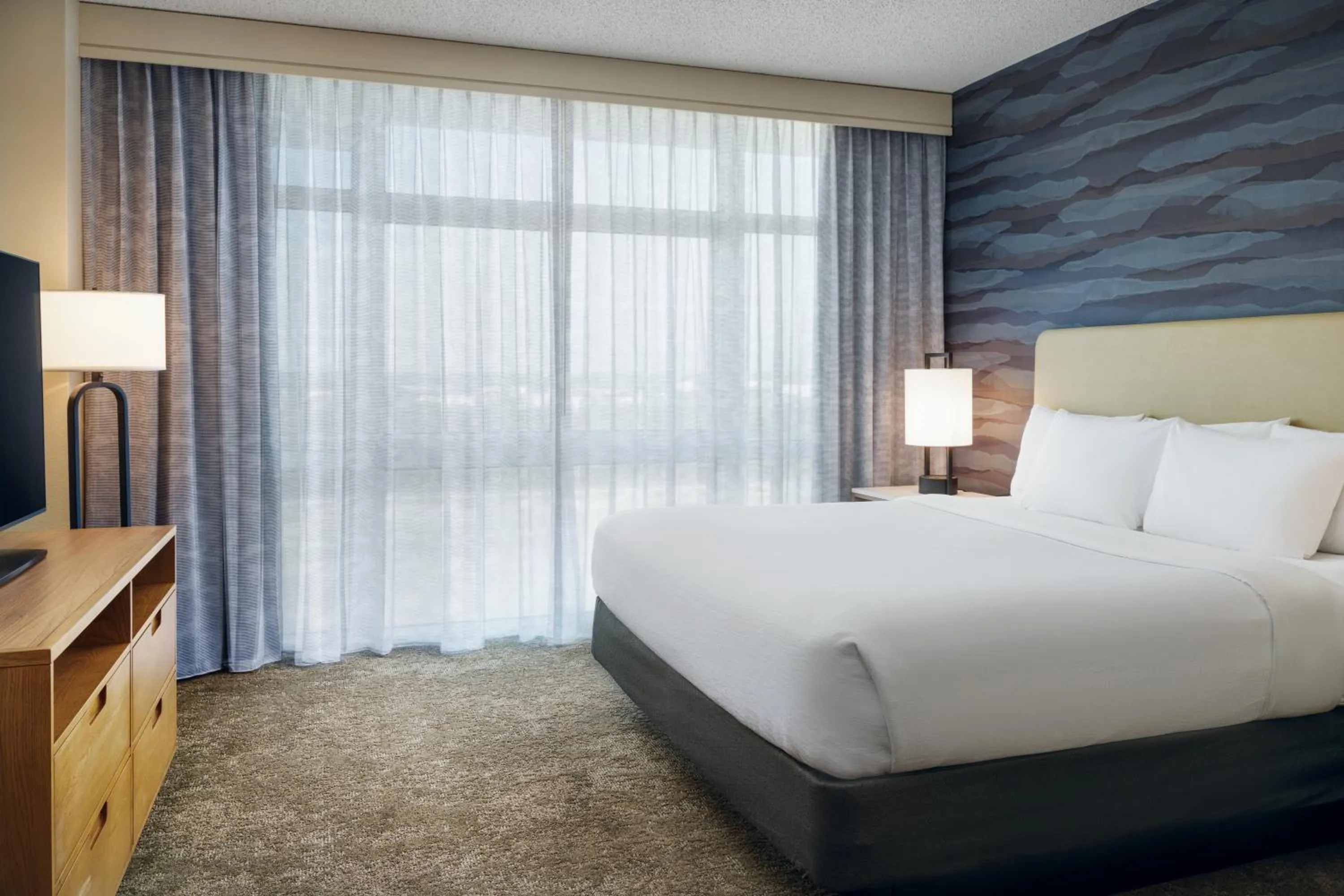 Bed in Embassy Suites North Charleston Airport Hotel Convention