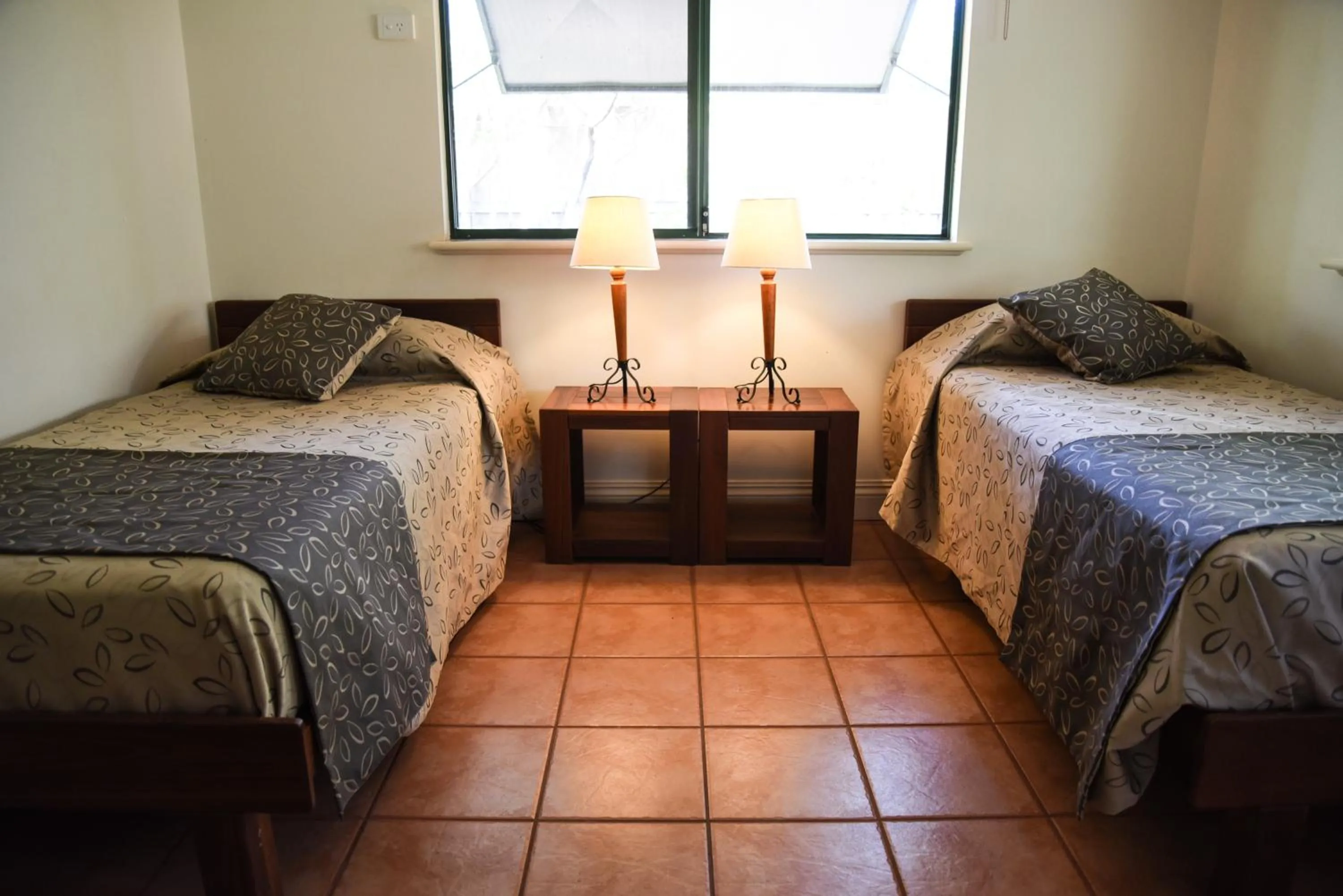 Bed in Cocos Beach Bungalows