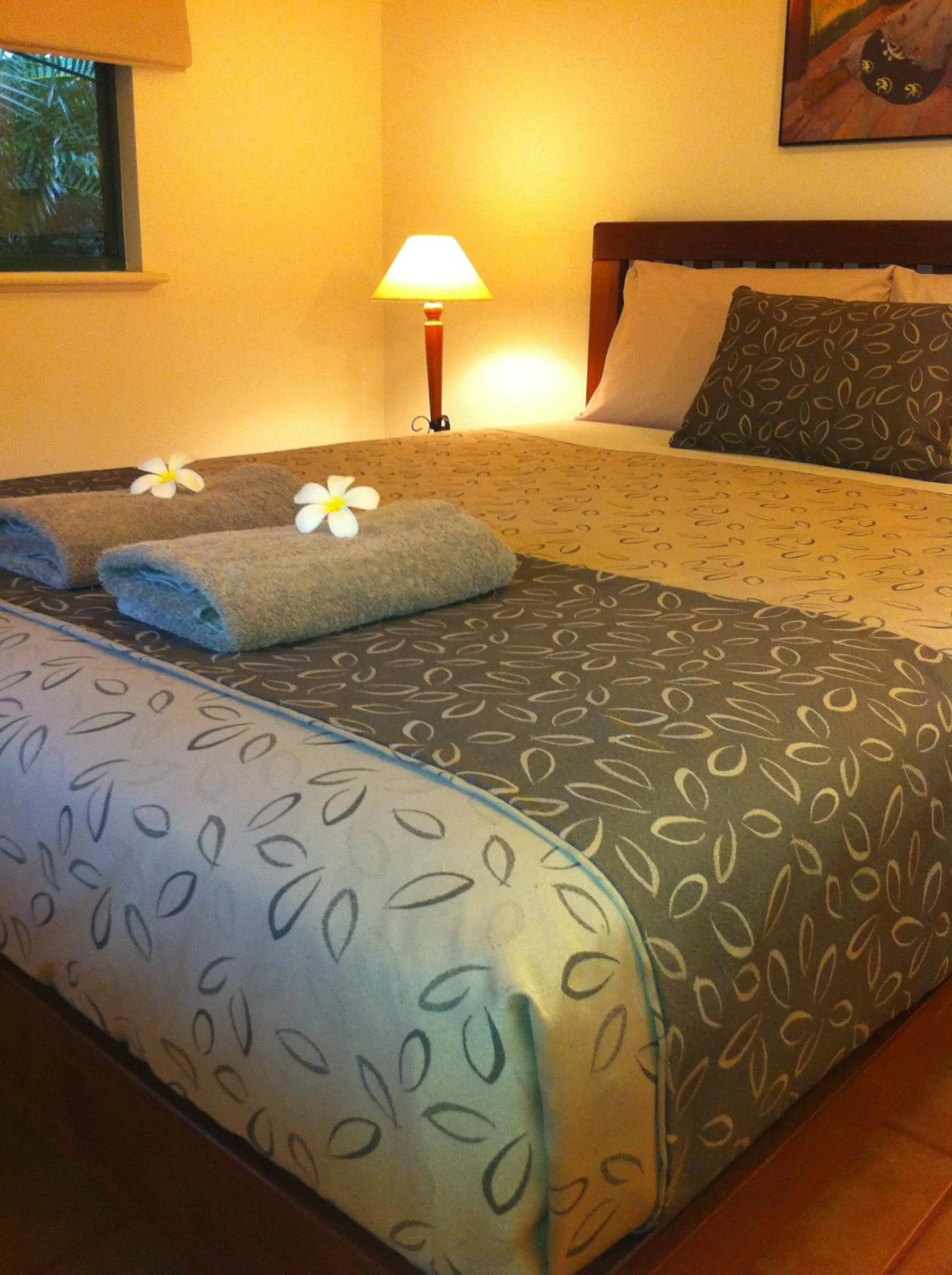 Bed in Cocos Beach Bungalows