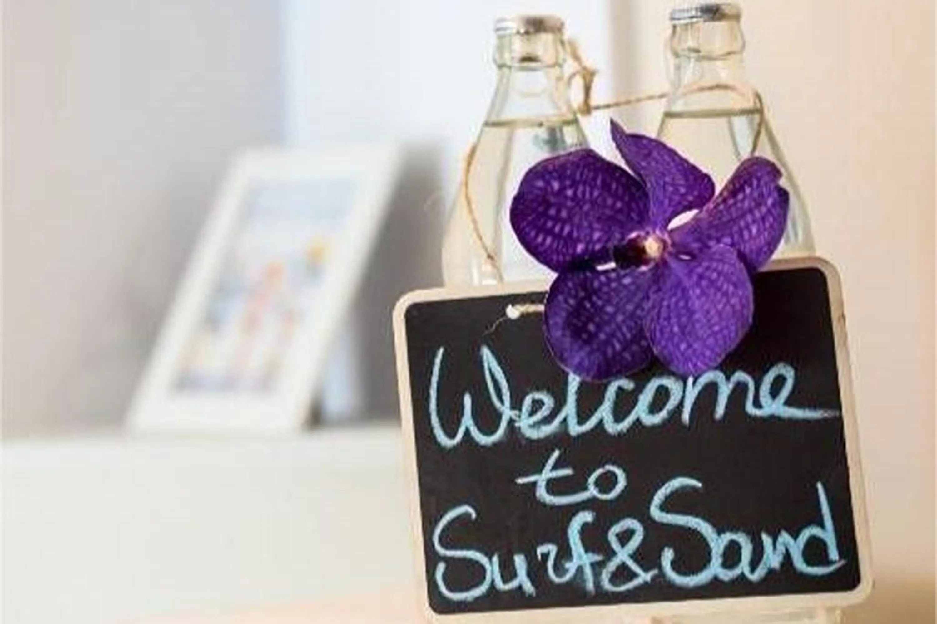 Property logo or sign in Surf & Sand Resort