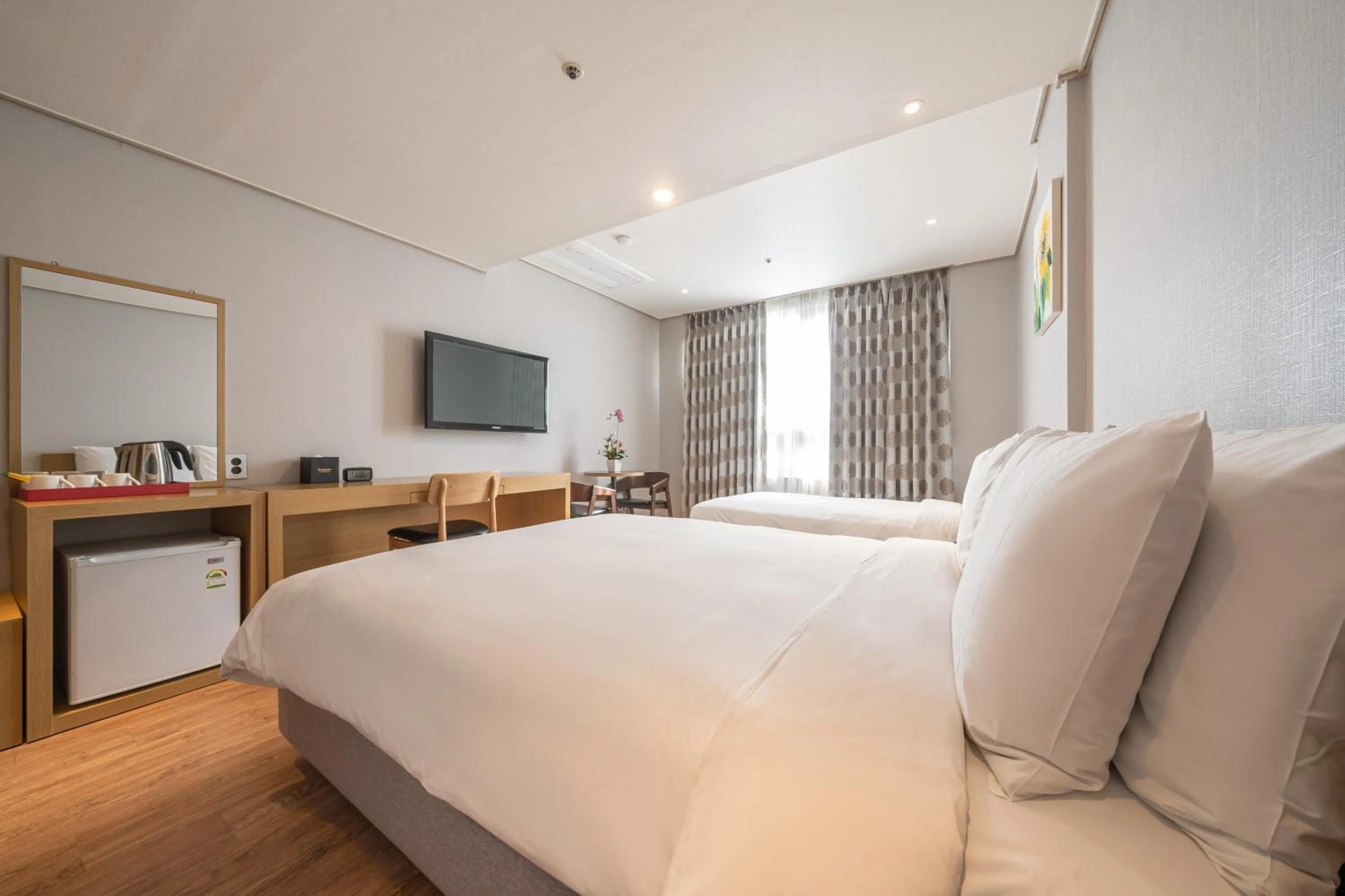 Bed in Ramada by Wyndham Seoul Dongdaemun