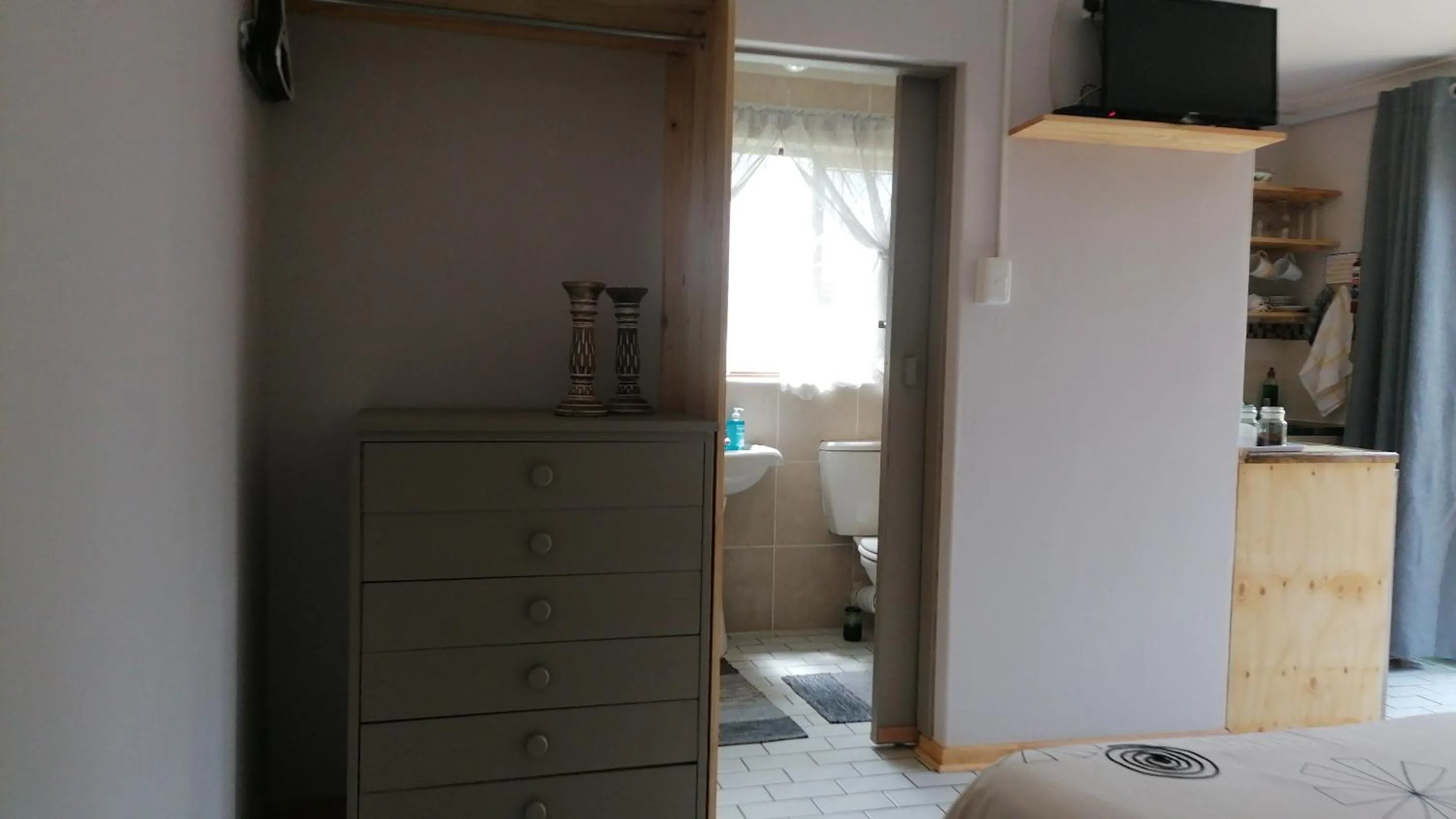 wardrobe in A1 Kynaston Guest House bed and breakfast or self catering