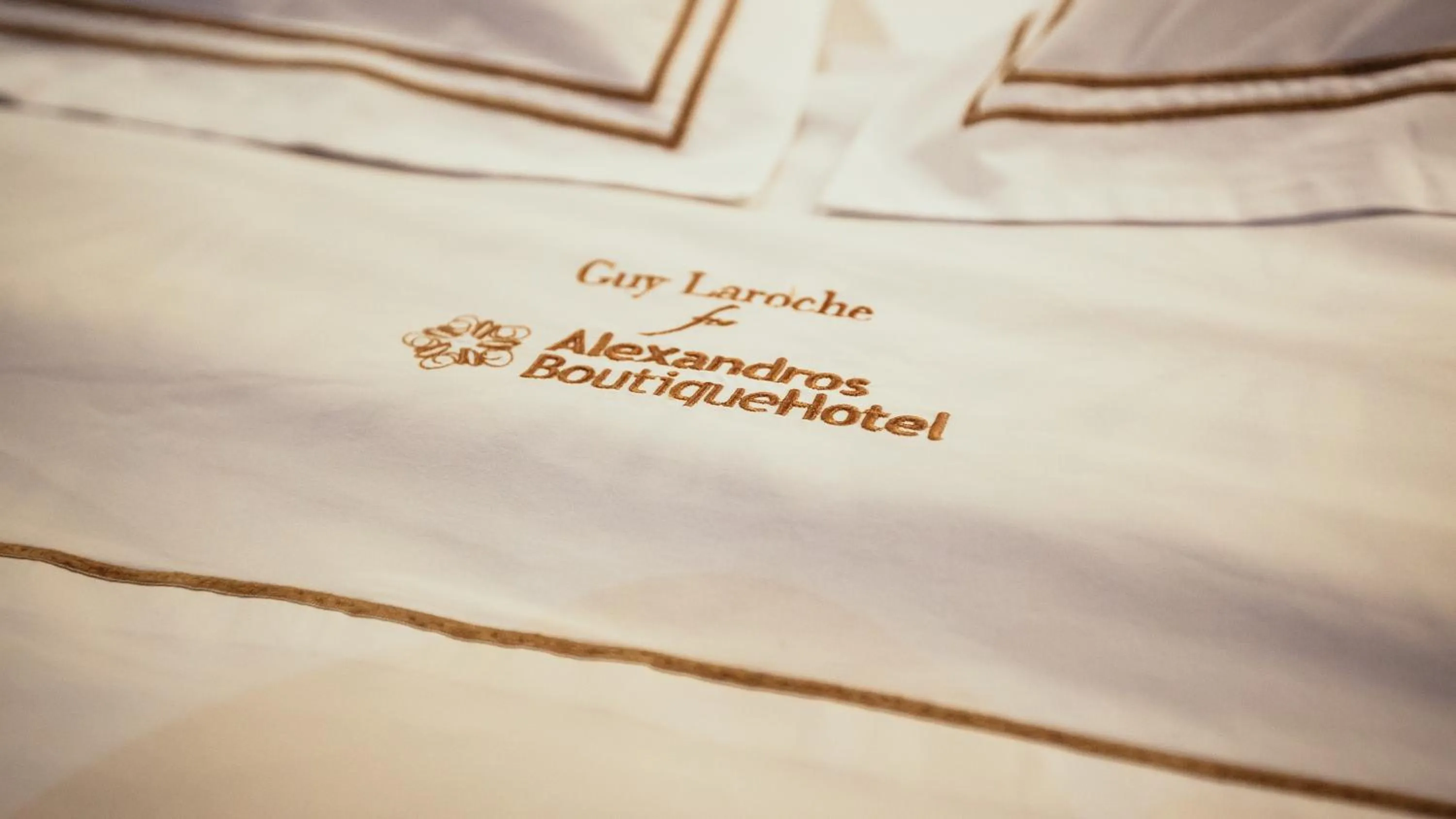 Property logo or sign, Bed in Alexandros Boutique Hotel