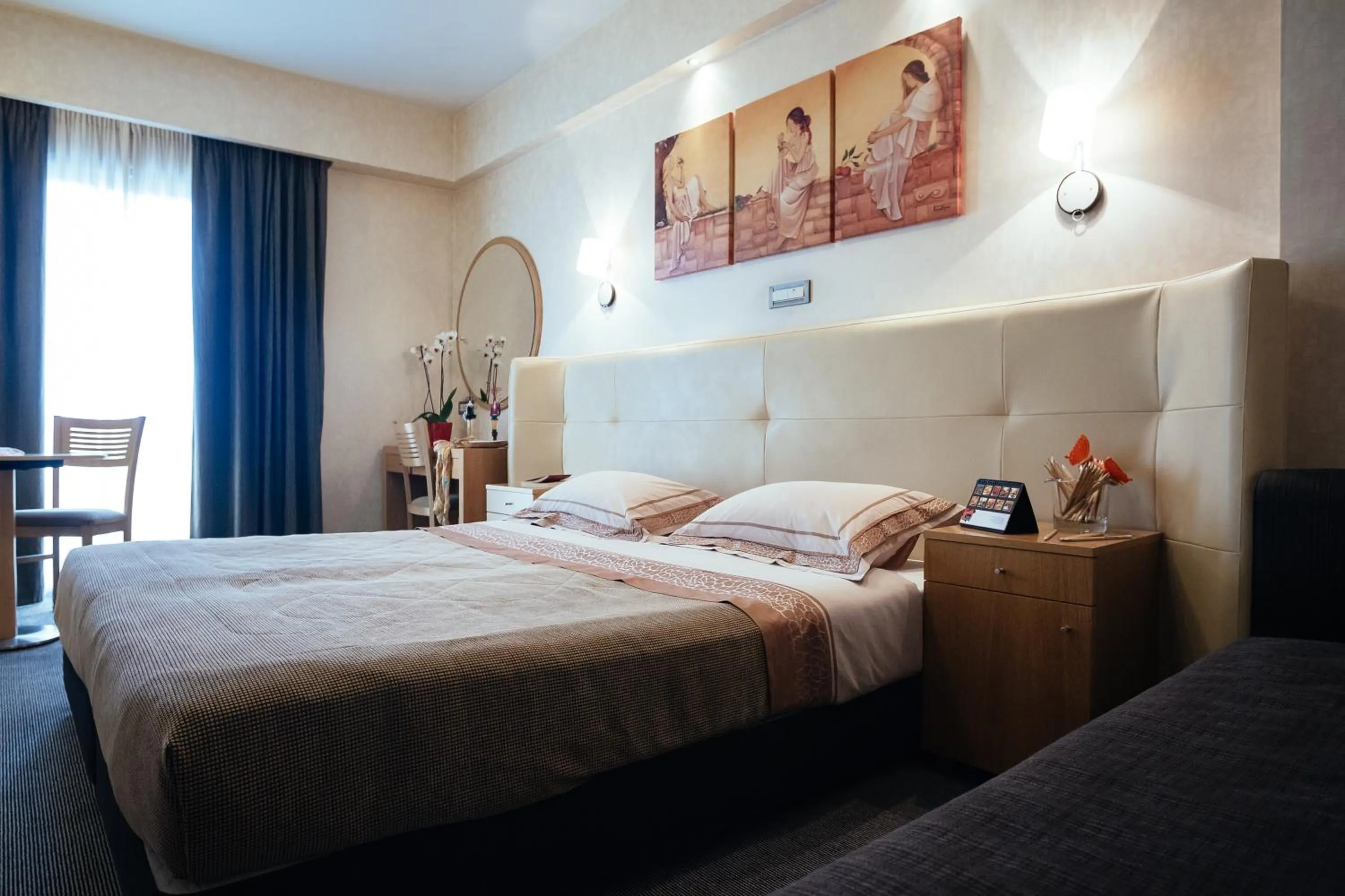 Photo of the whole room, Bed in Alexandros Boutique Hotel